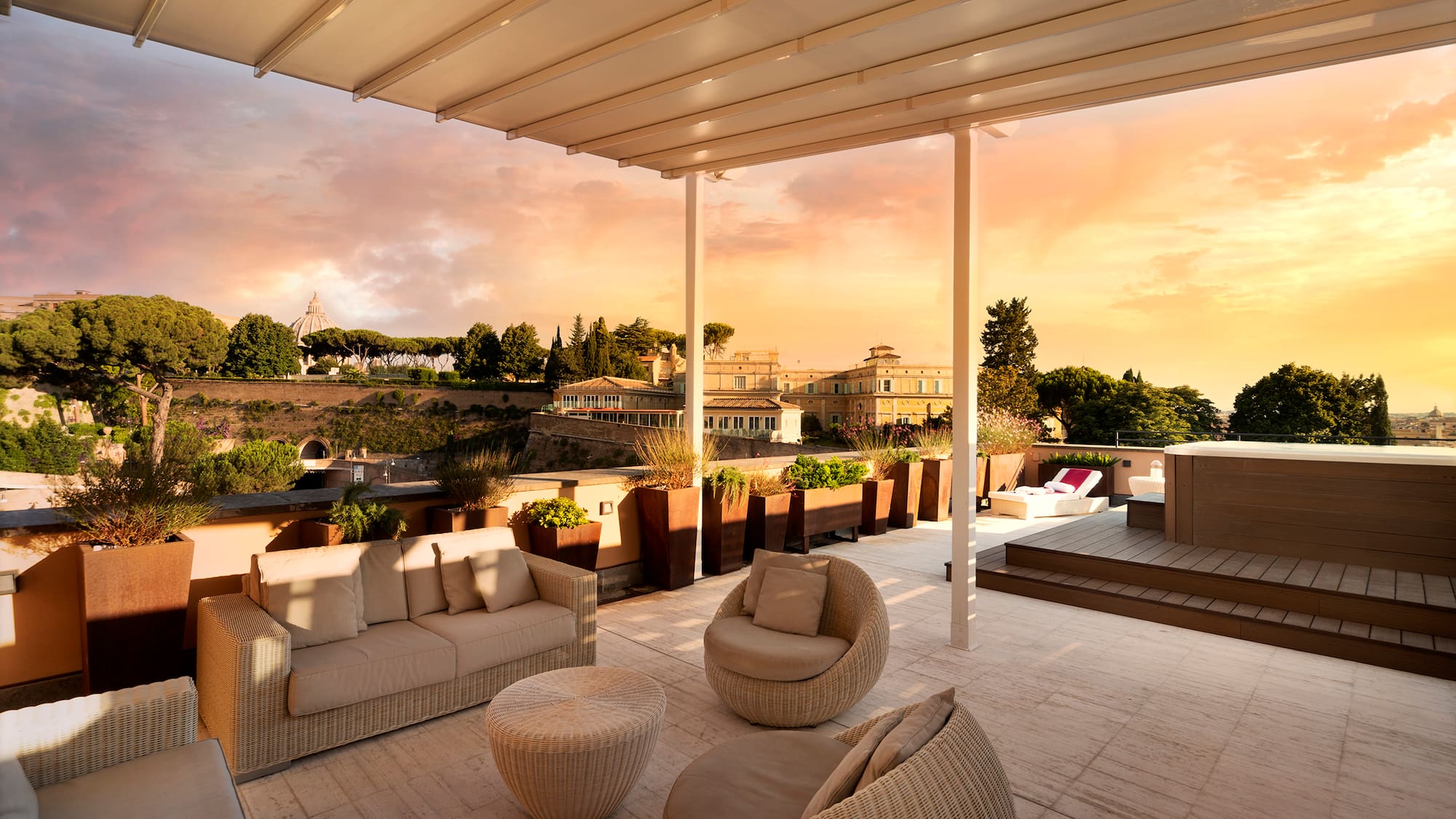 a patio with a covered patio and a view of a city