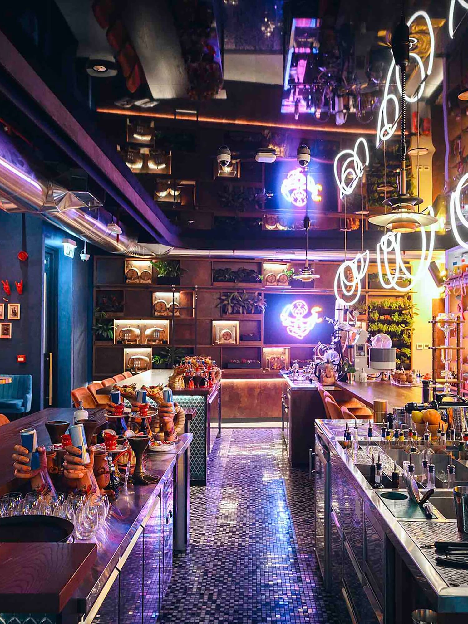 a bar with many tables and chairs