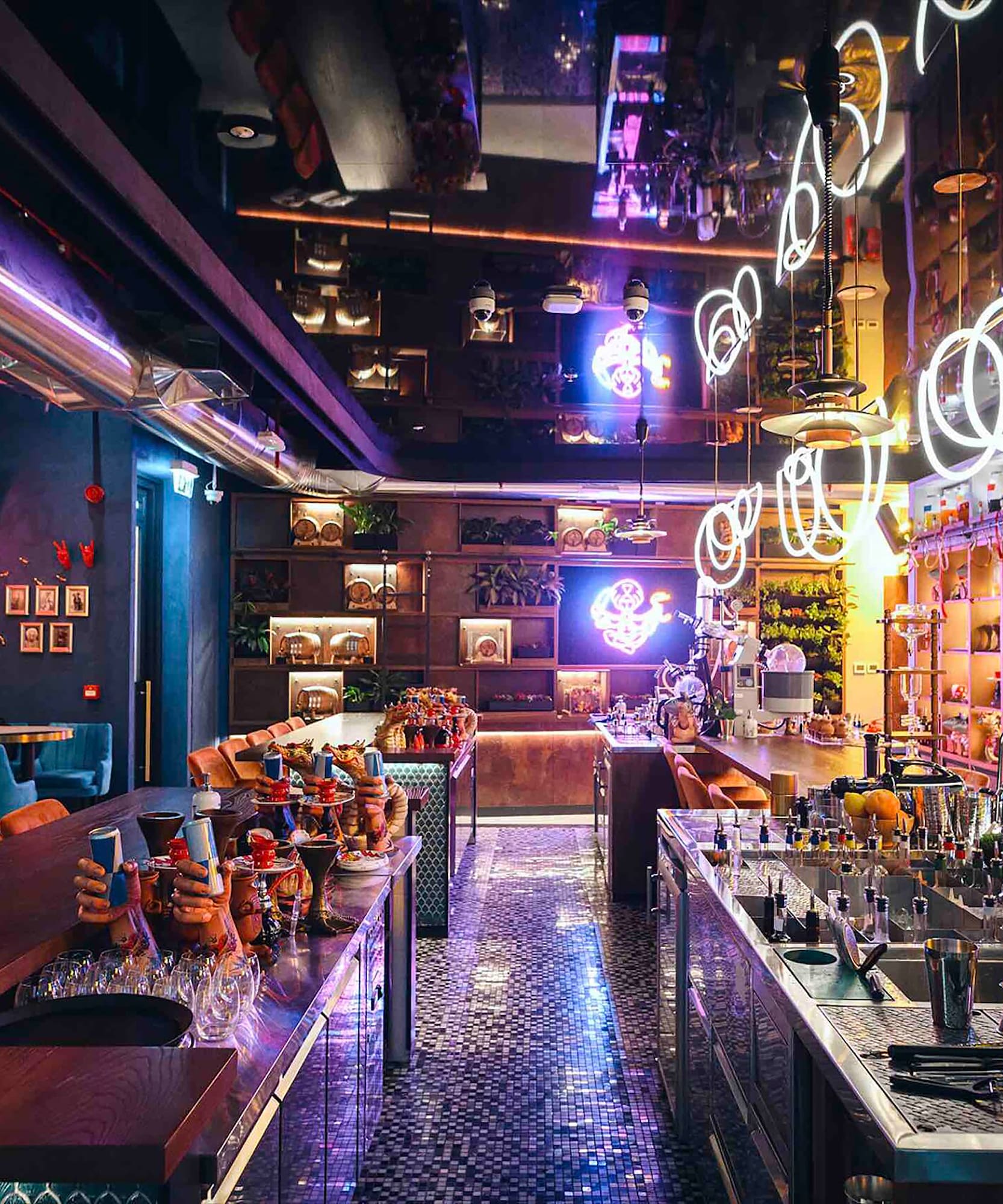 a bar with many tables and chairs