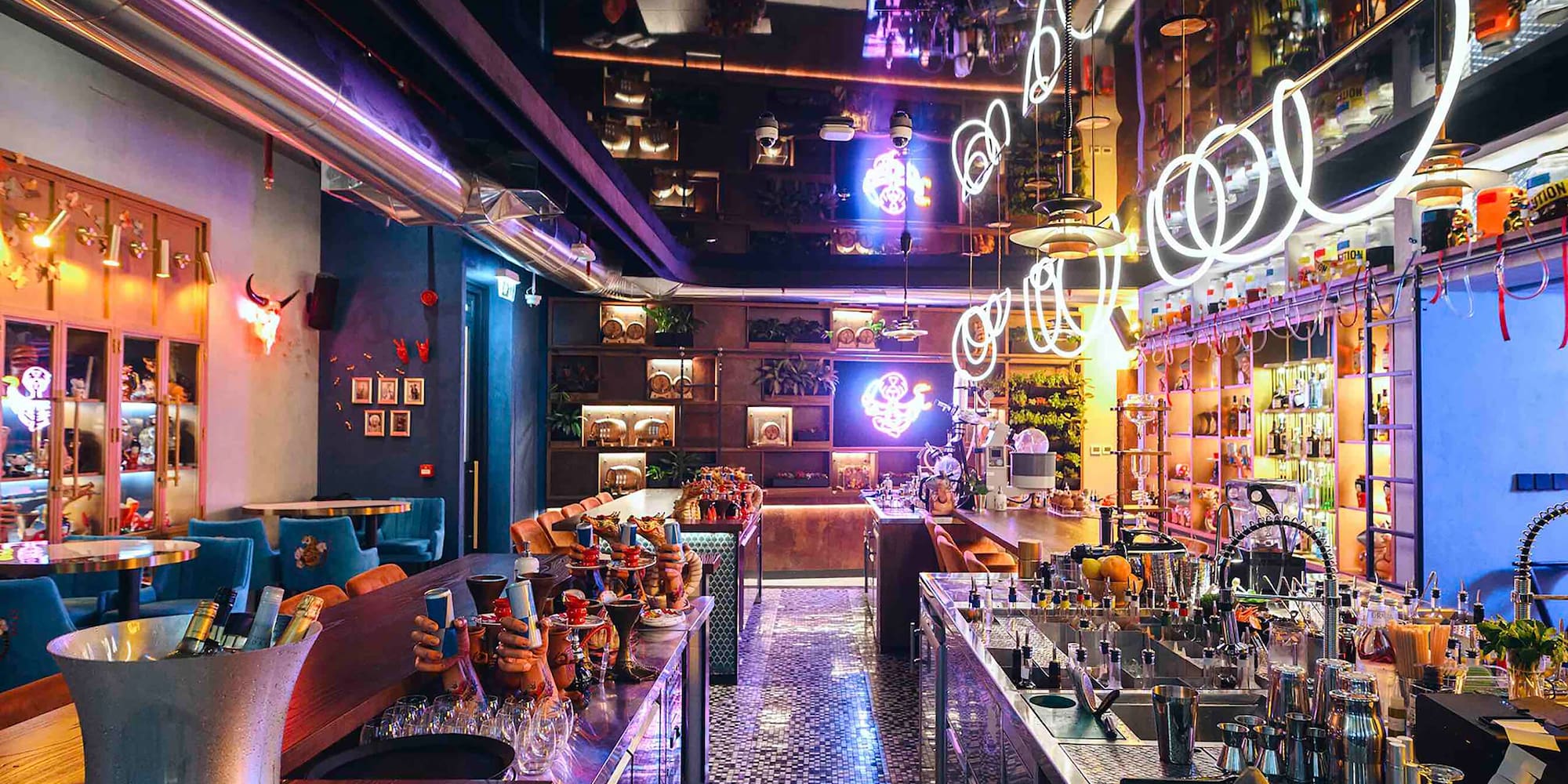 a bar with many tables and chairs