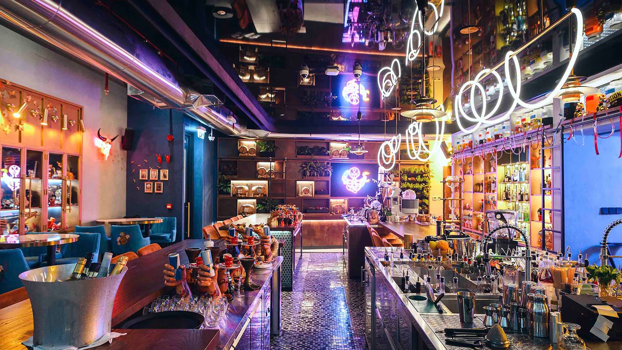 a bar with many tables and chairs