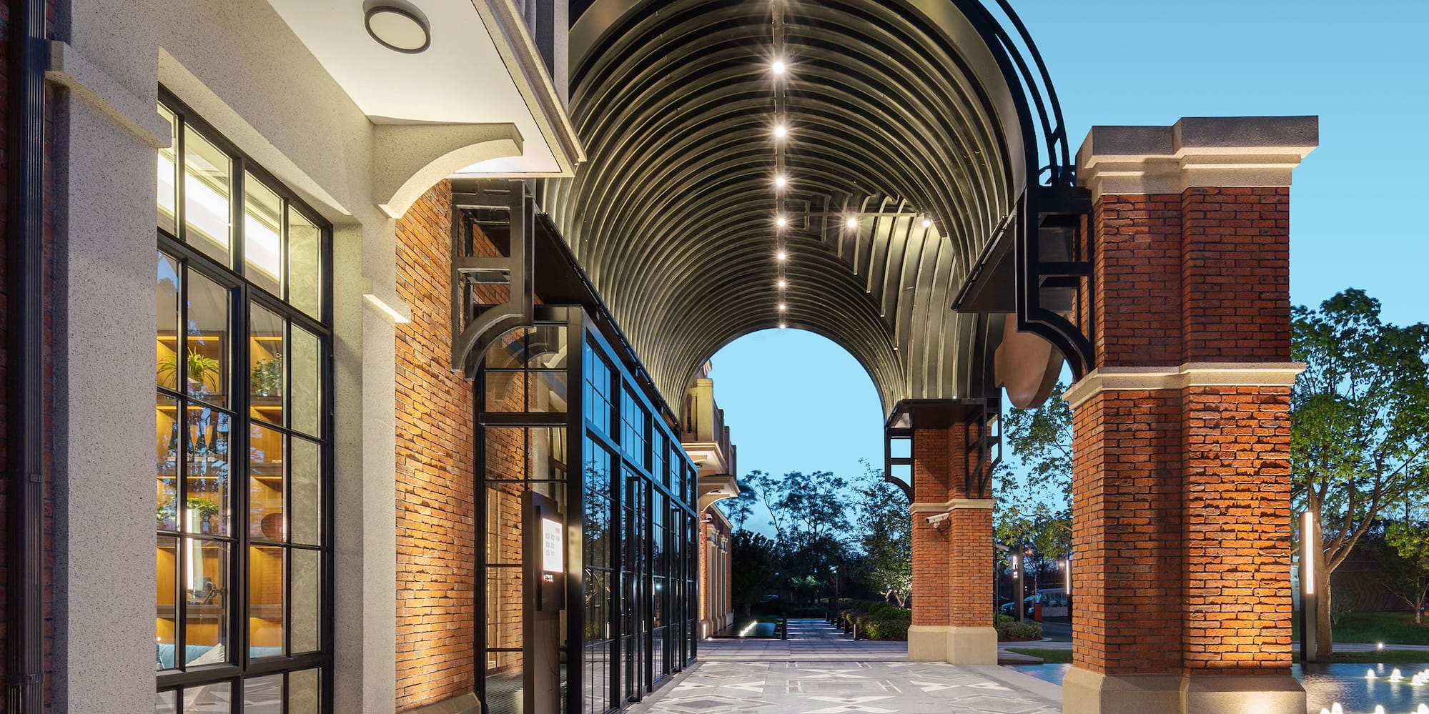 a walkway with a walkway over a building