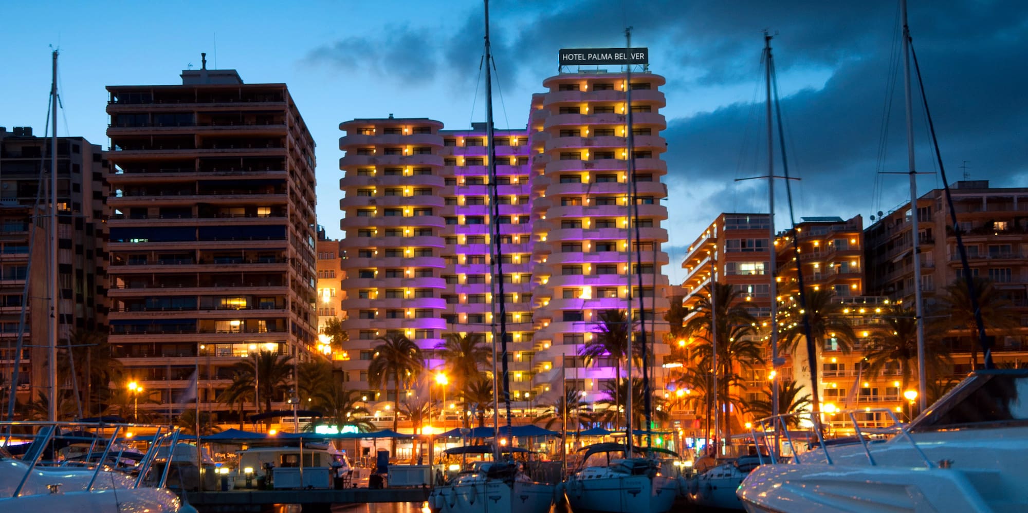 a group of boats in a harbor