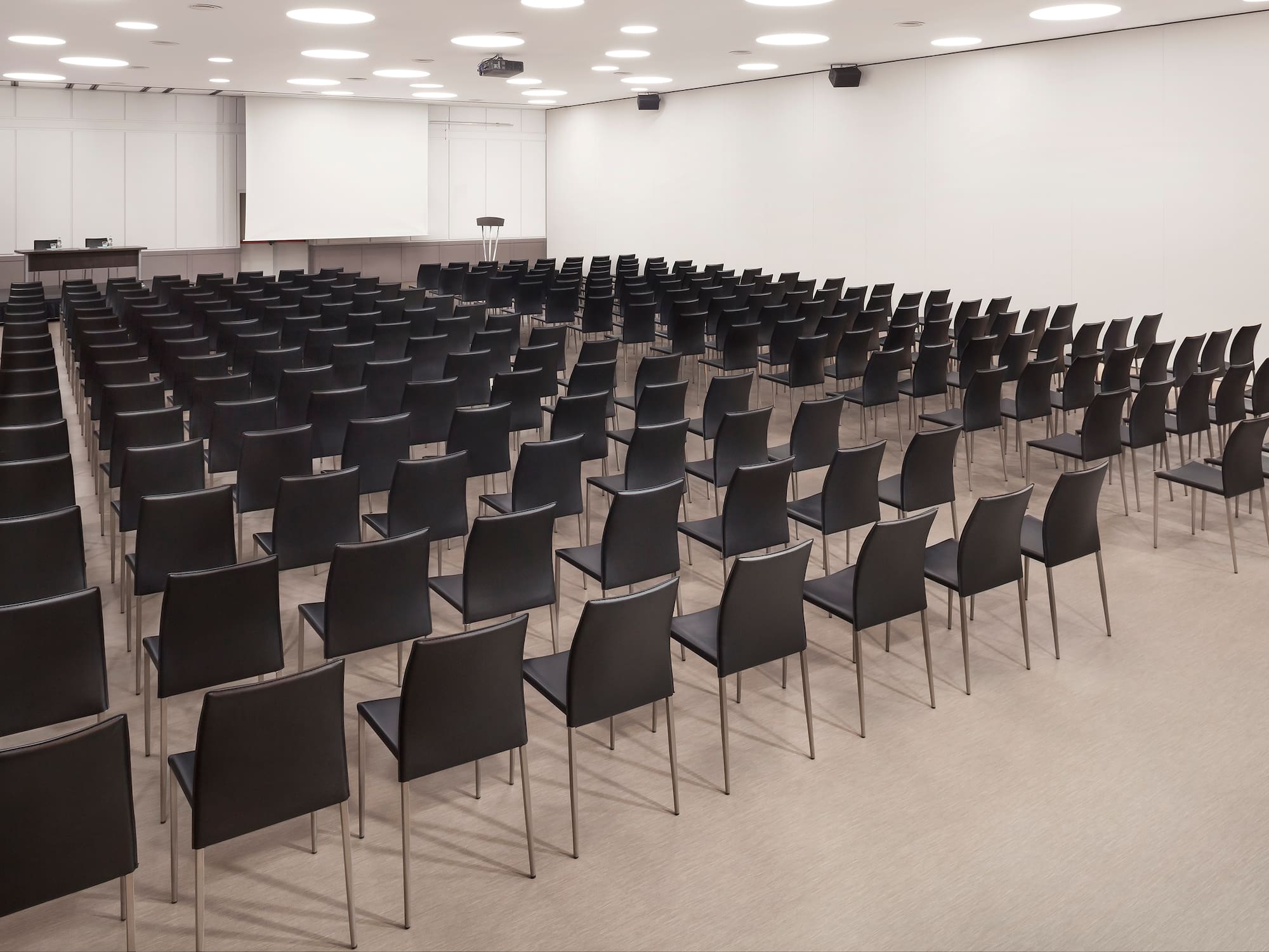 a room with rows of chairs