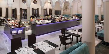 a restaurant with tables and chairs