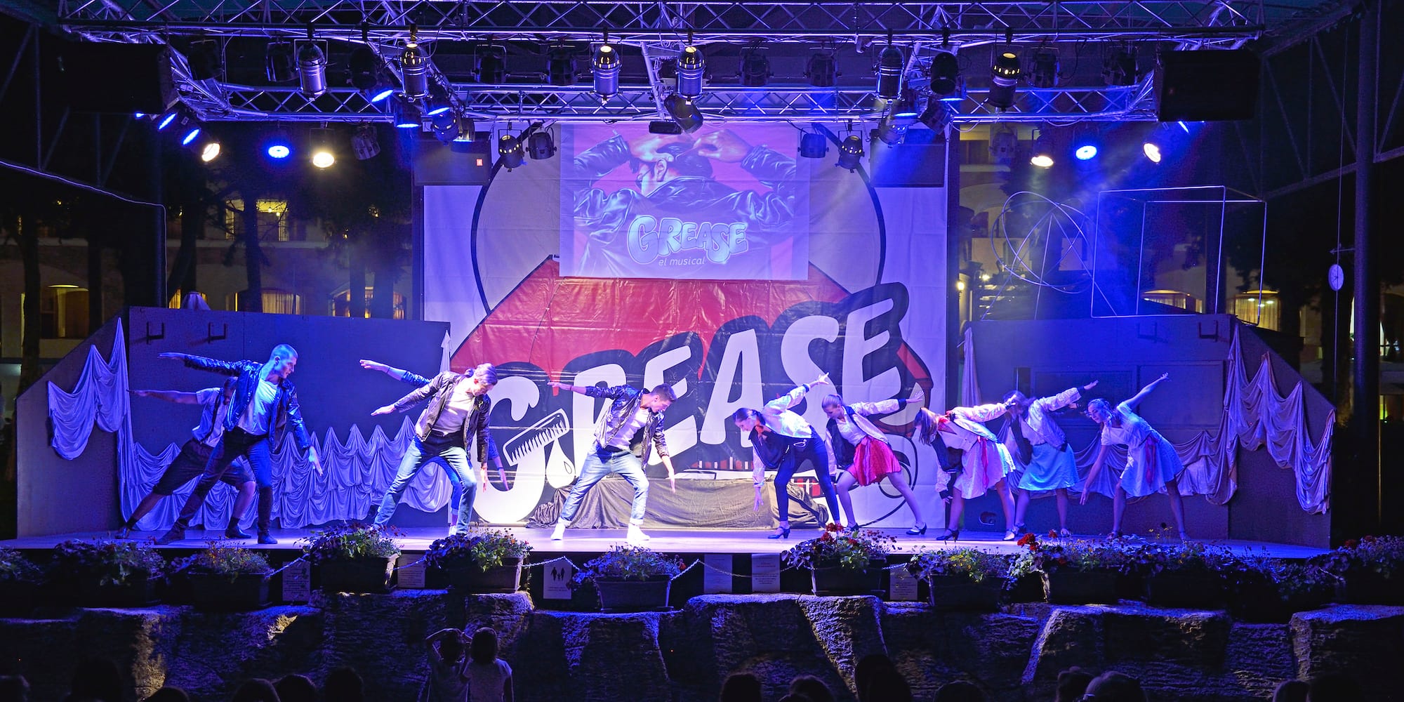 a group of people on a stage