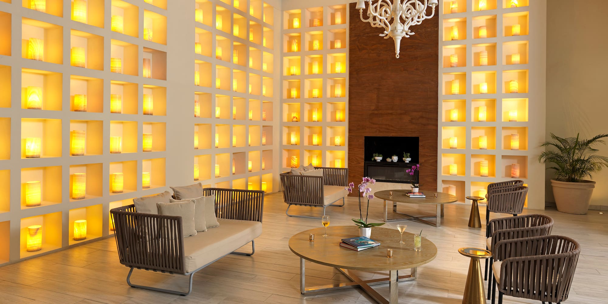 a room with a fireplace and couches