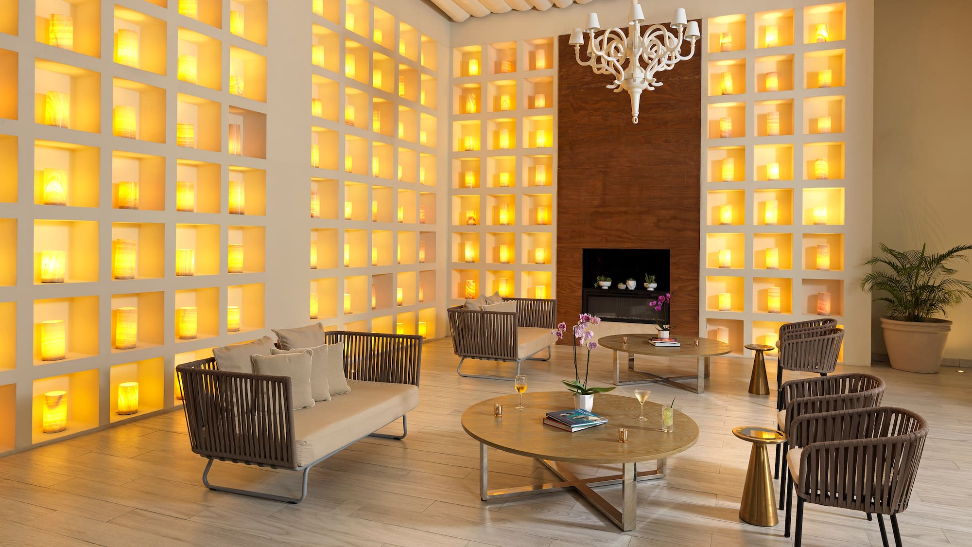 a room with a fireplace and couches