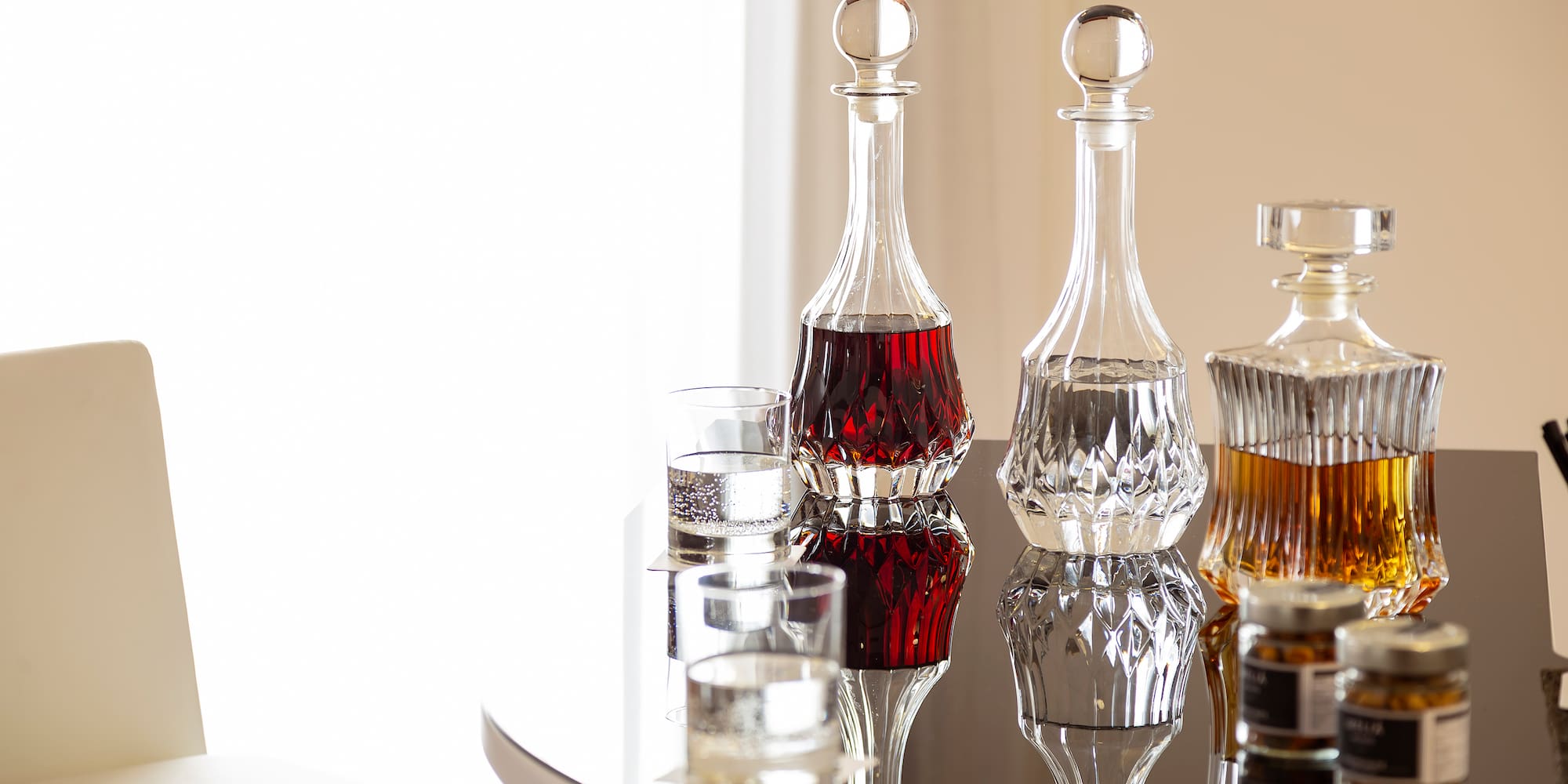 a group of decanters on a table