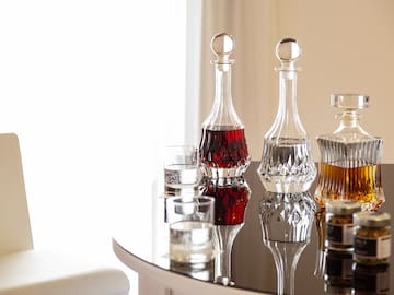 a group of decanters on a table