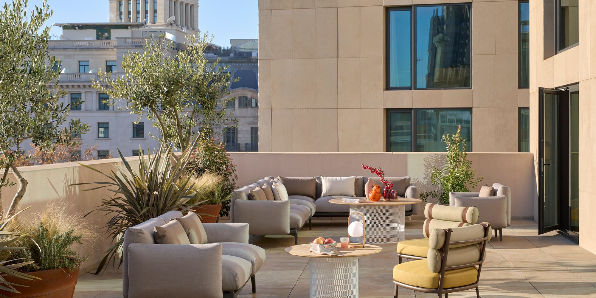 a patio with furniture and a table