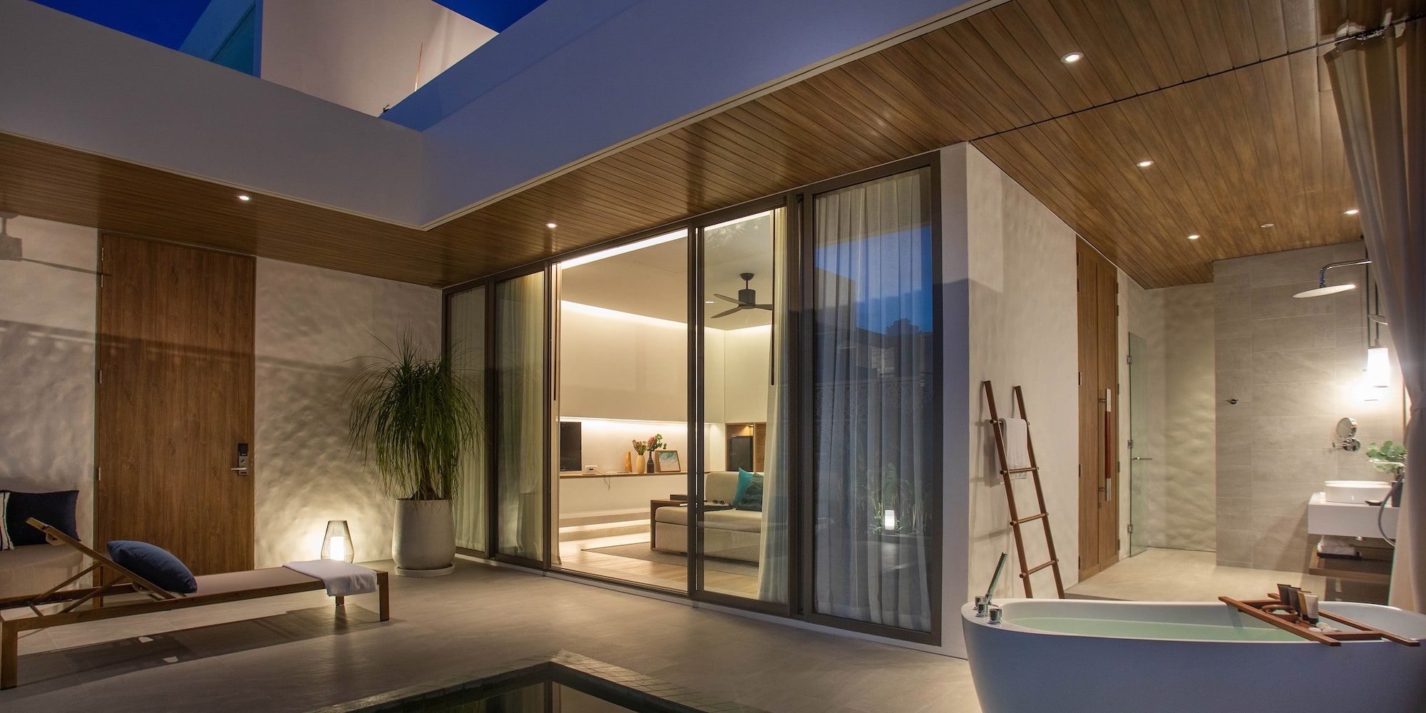 a house with a tub and a pool