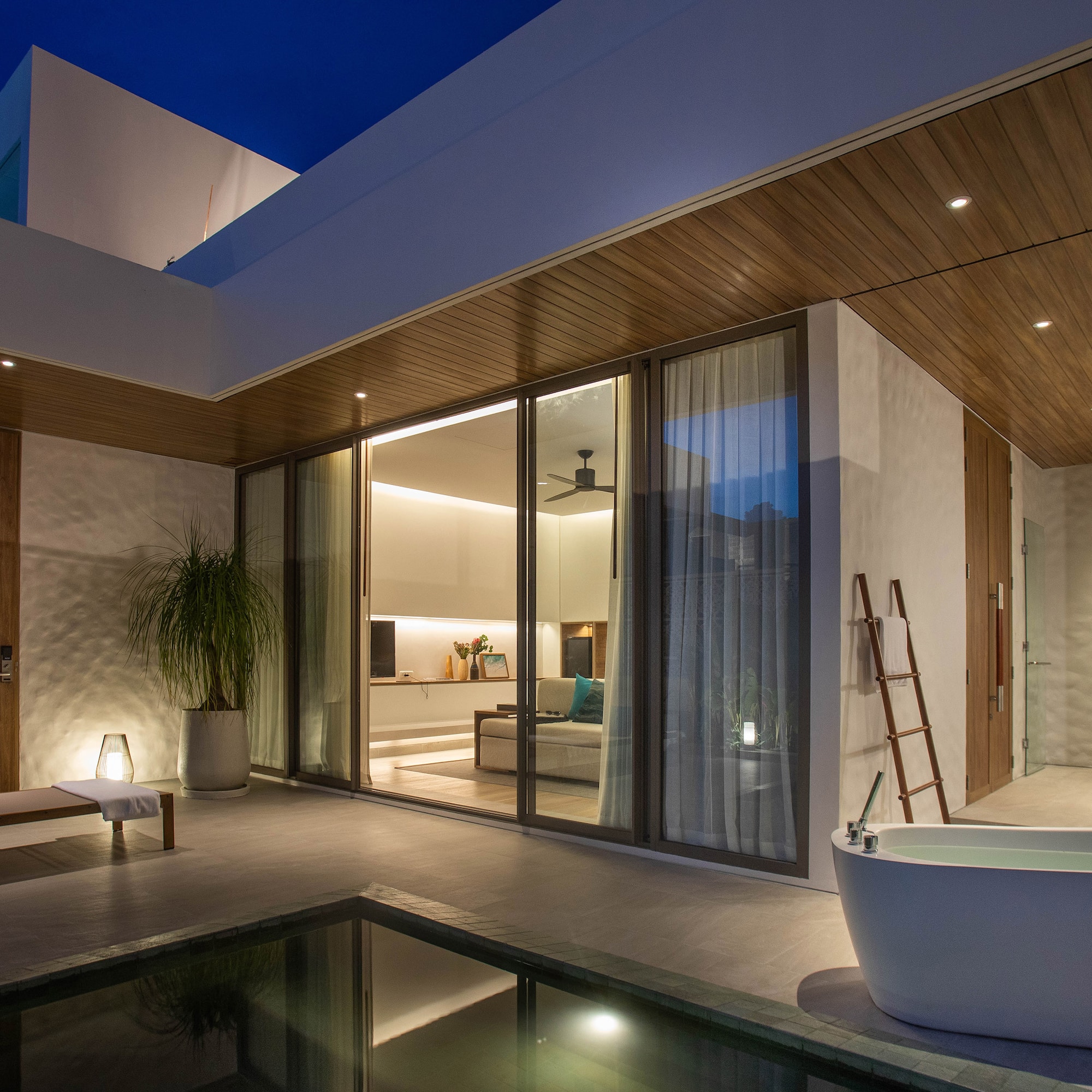 a house with a tub and a pool