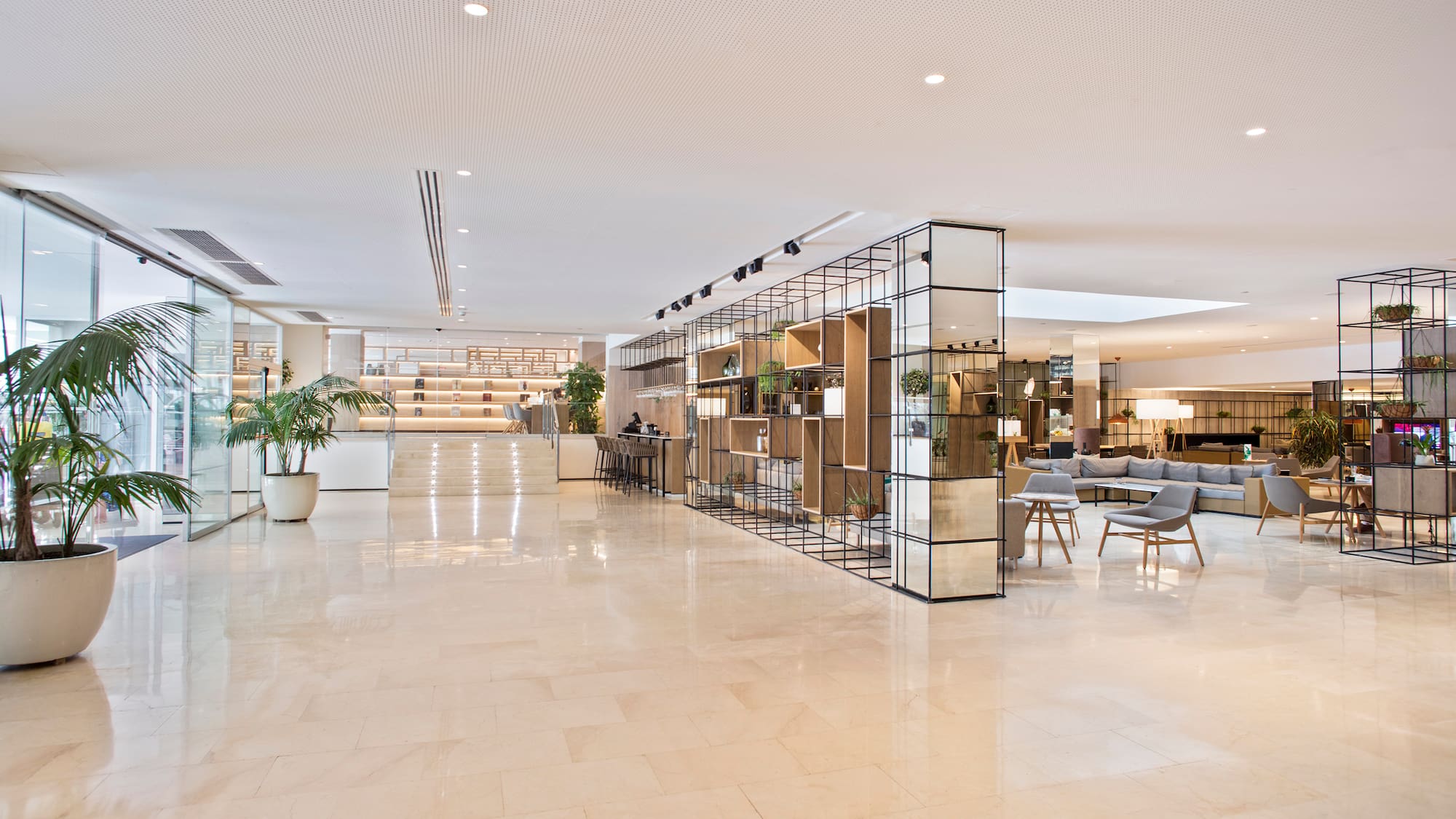 a large white room with a white ceiling and a white wall