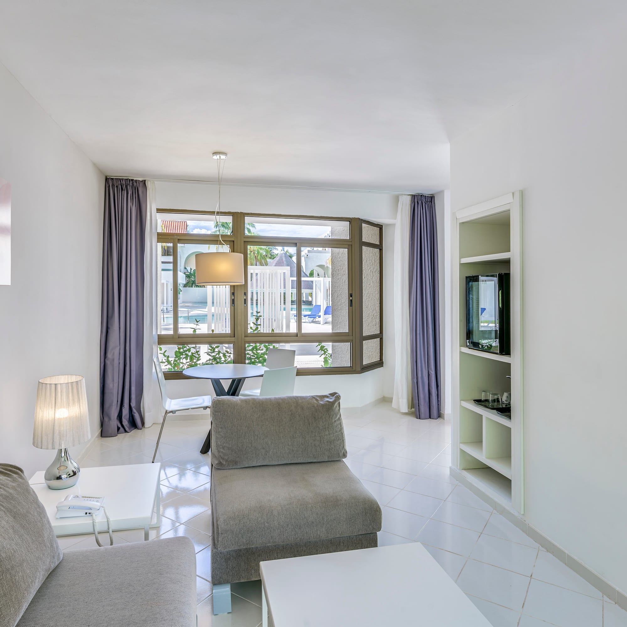 a living room with a couch and a table