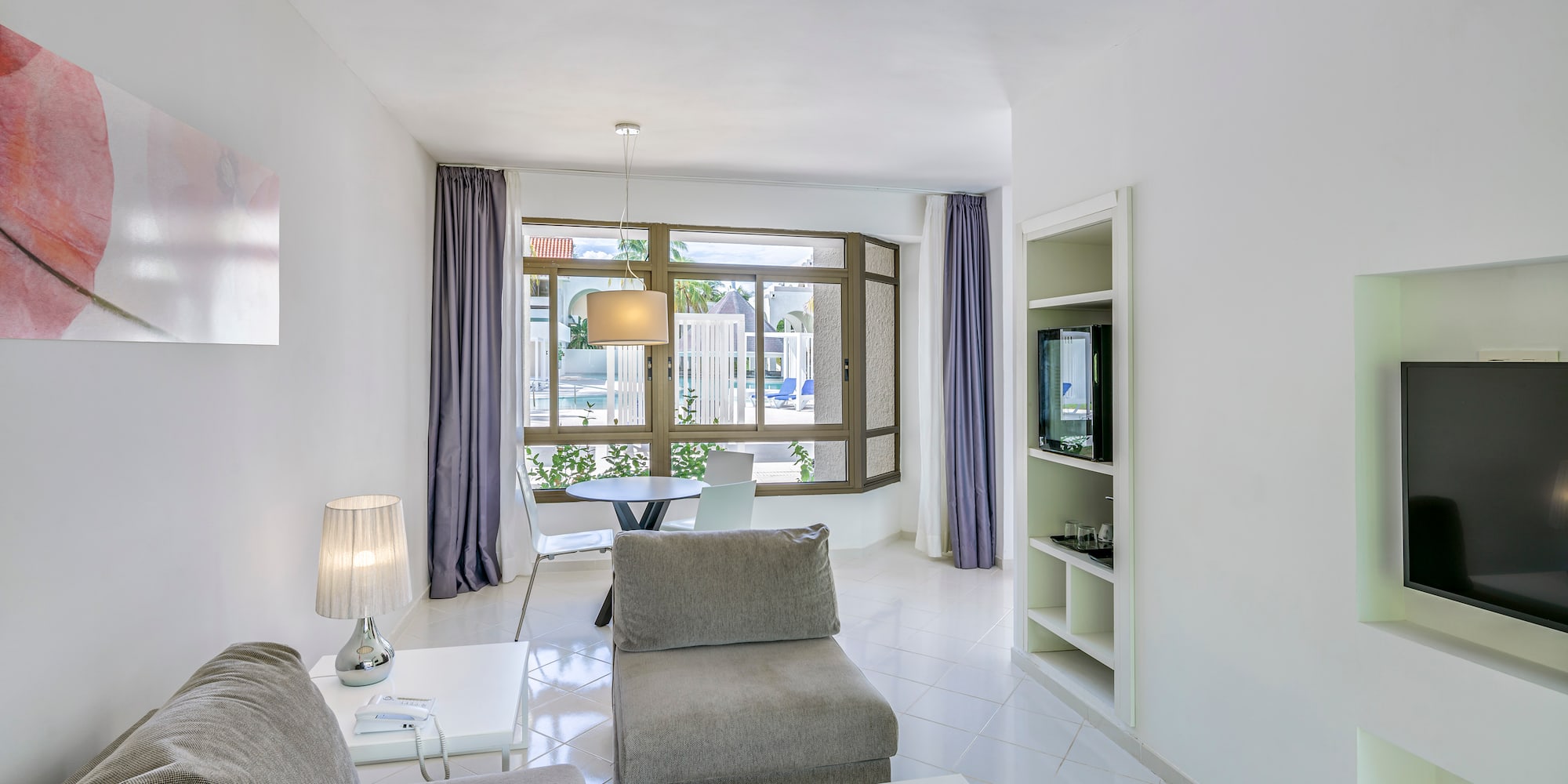 a living room with a couch and a table