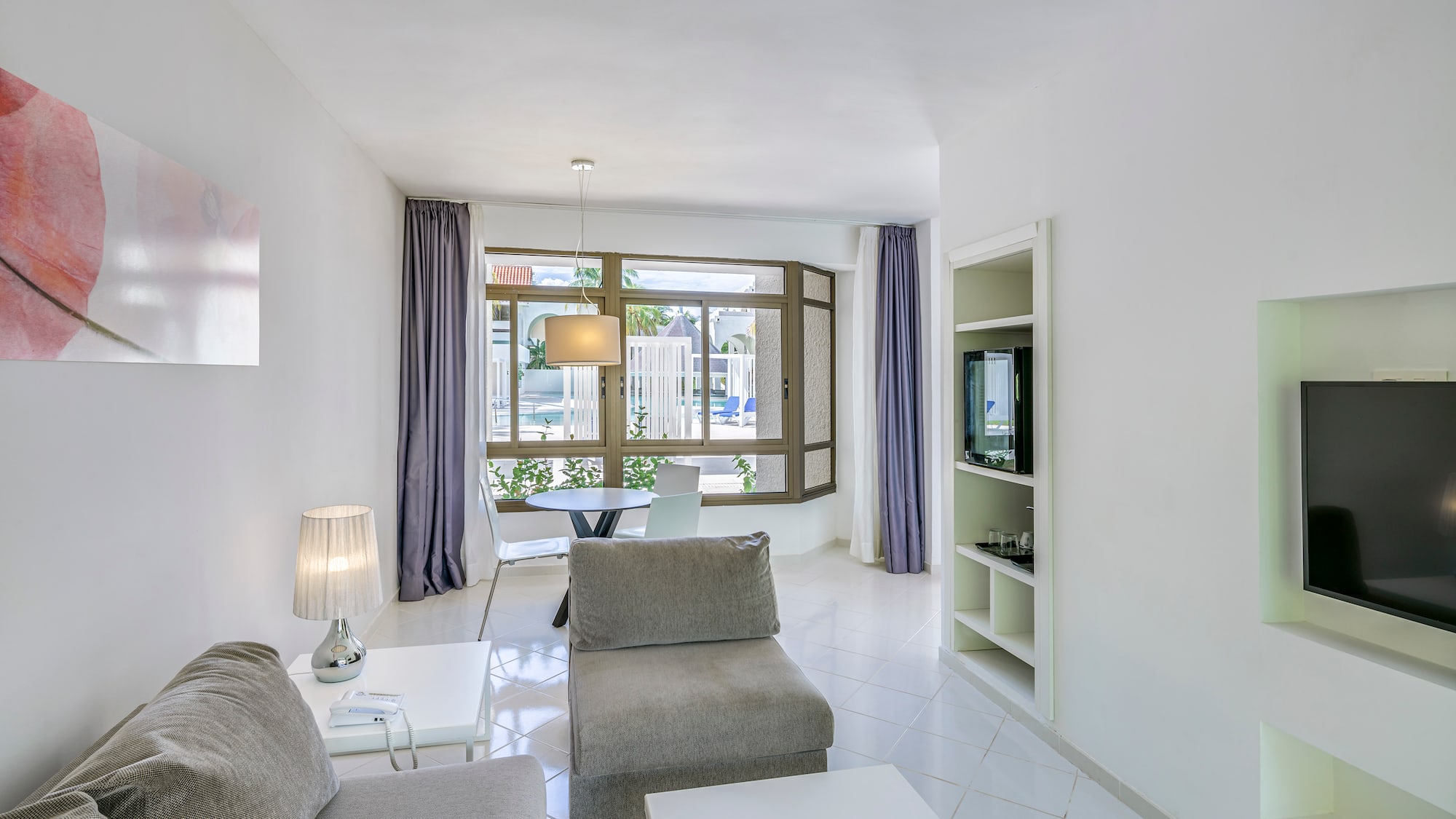 a living room with a couch and a table