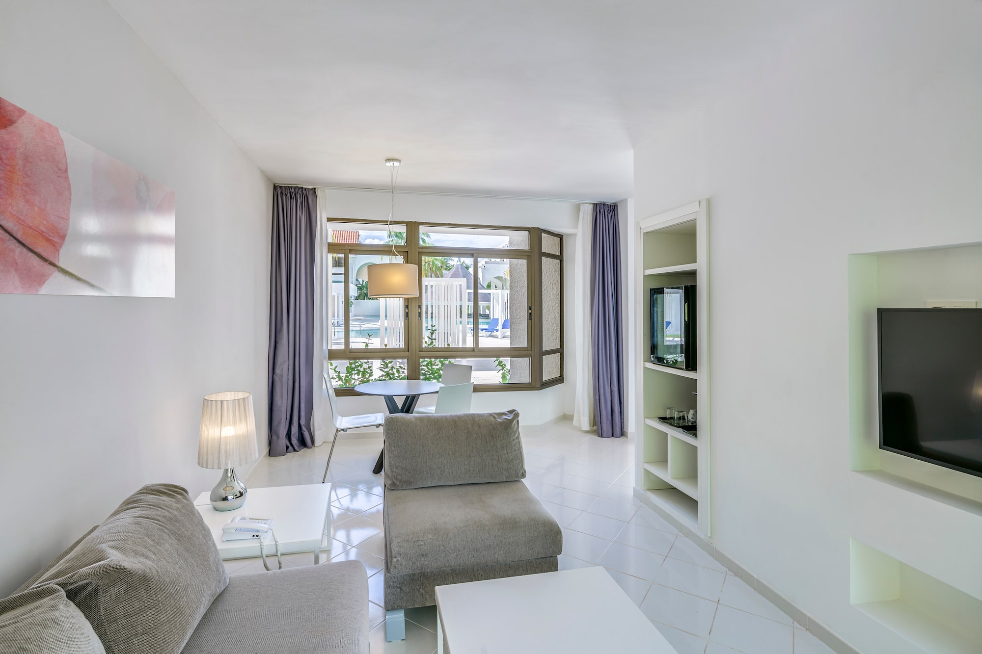 a living room with a couch and a table