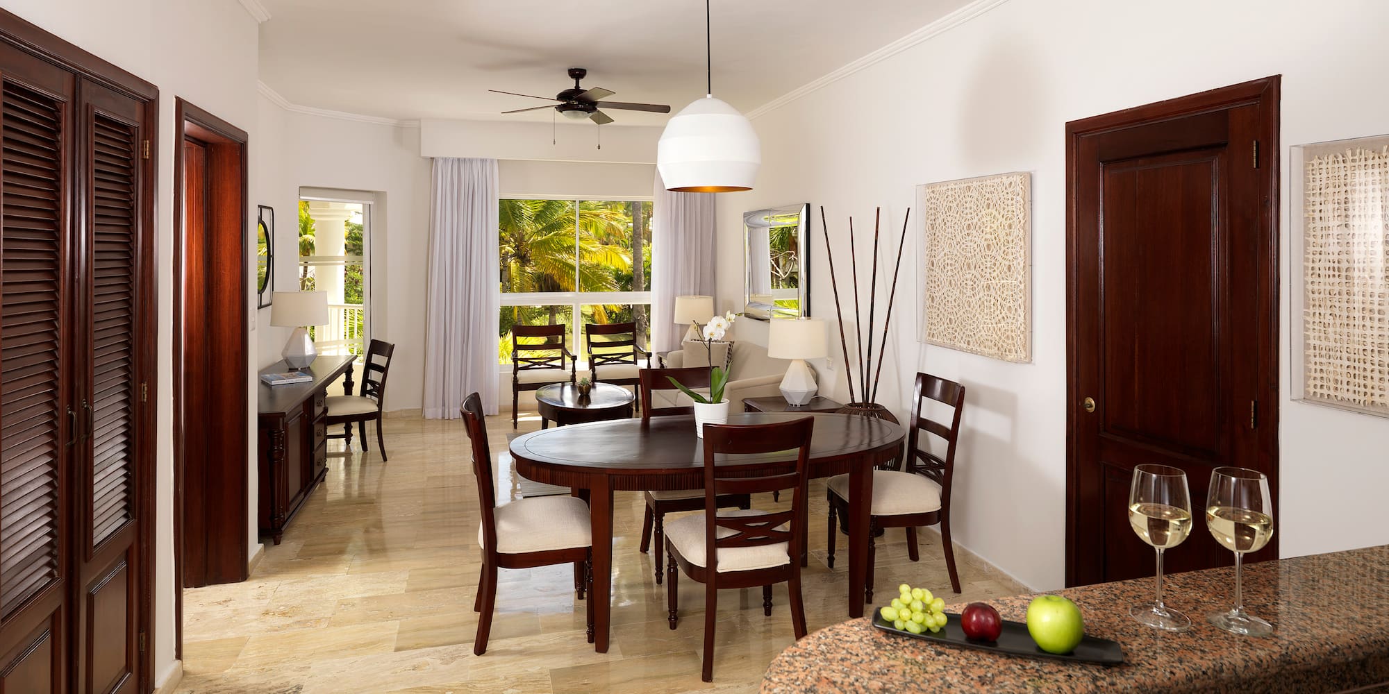 a room with a table and chairs