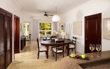 a room with a table and chairs