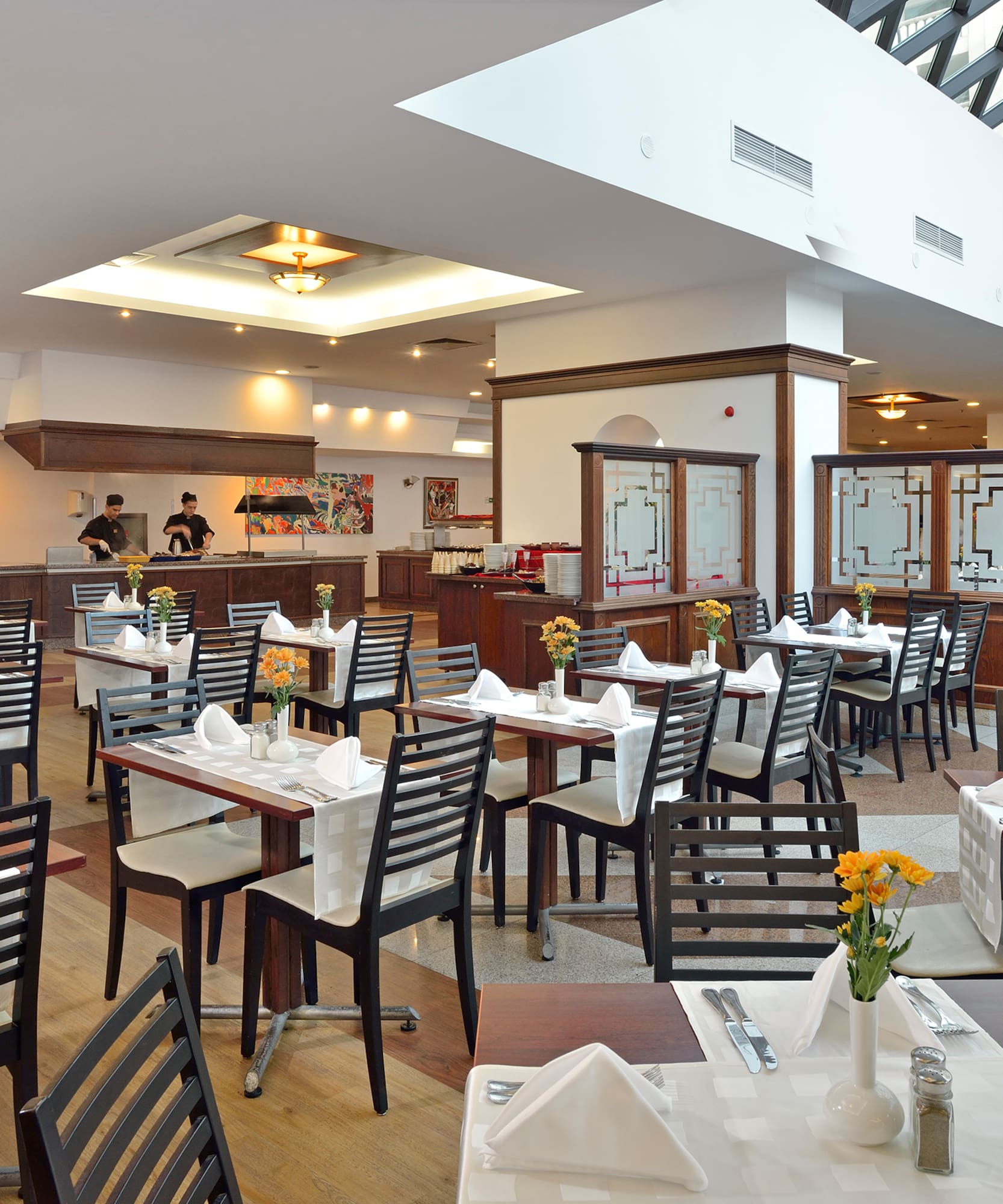 a room with tables and chairs