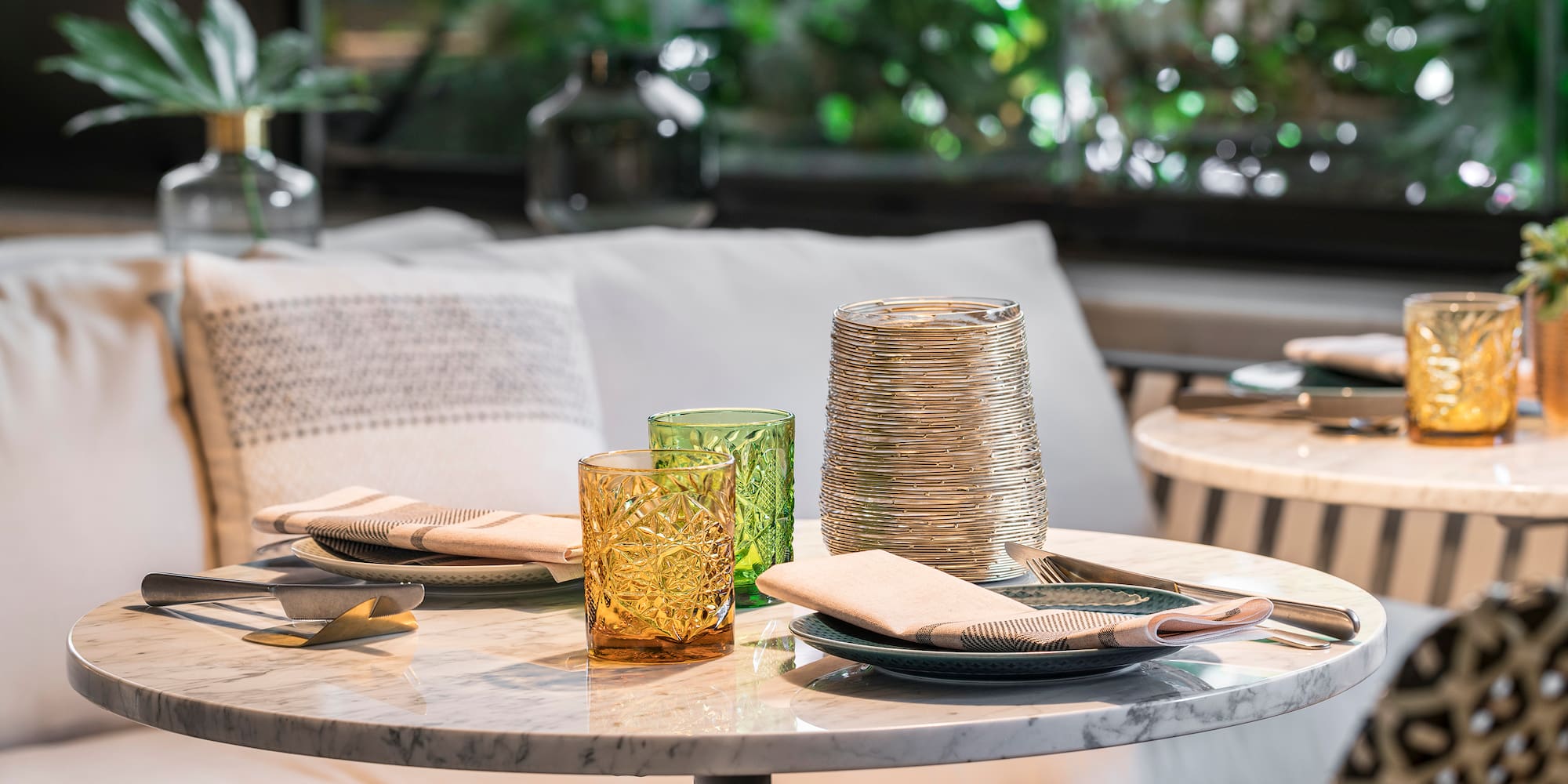 a table with plates and glasses on it