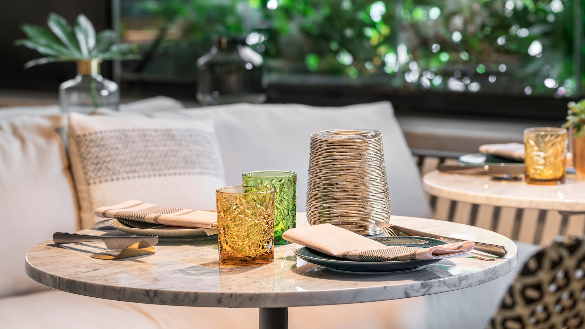 a table with plates and glasses on it