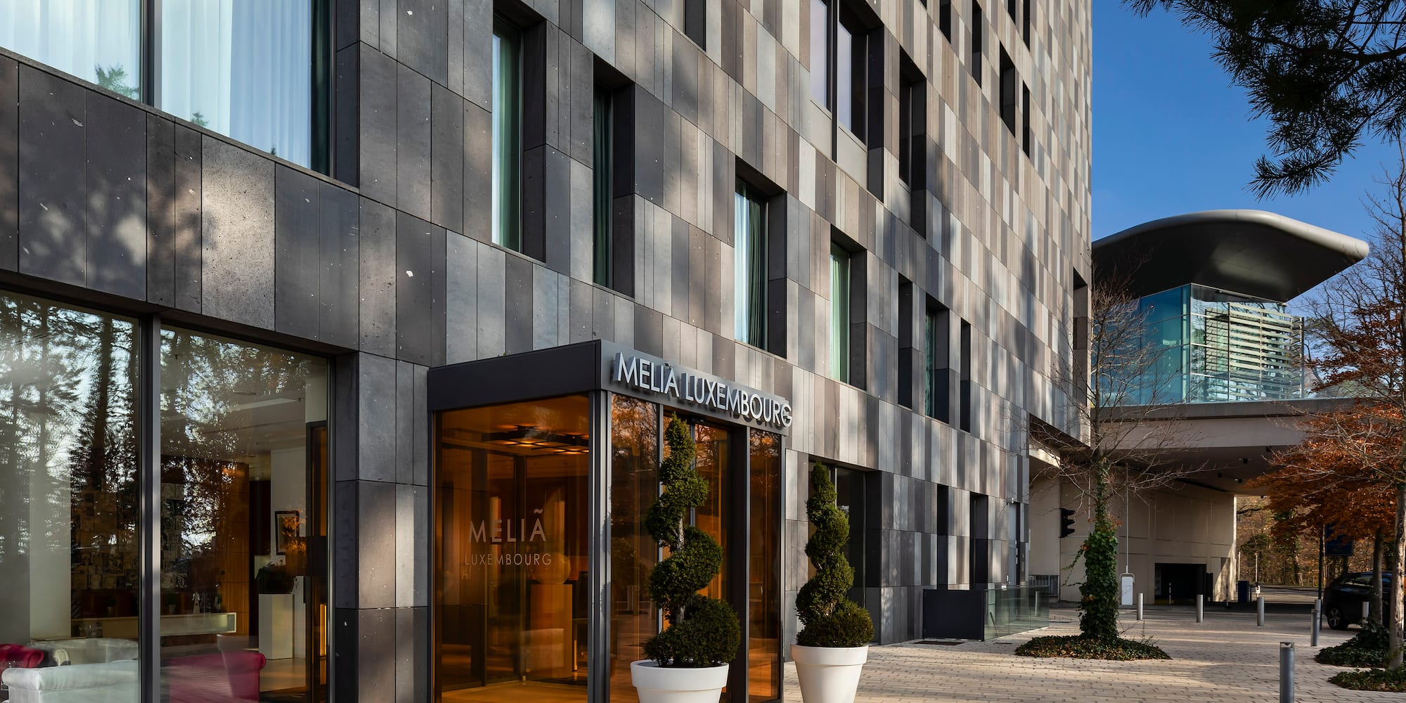 a building with glass doors and windows