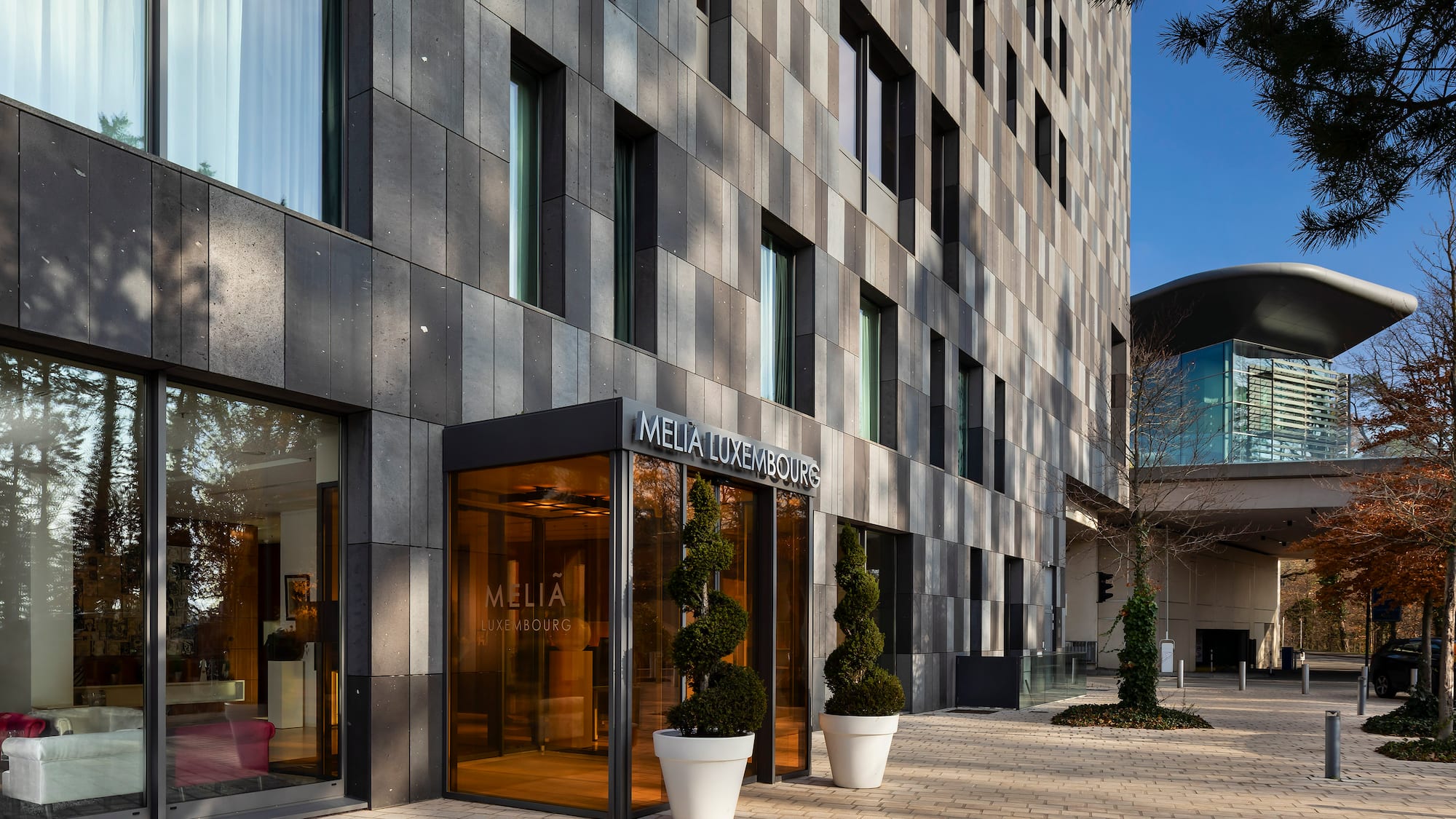 a building with glass doors and windows