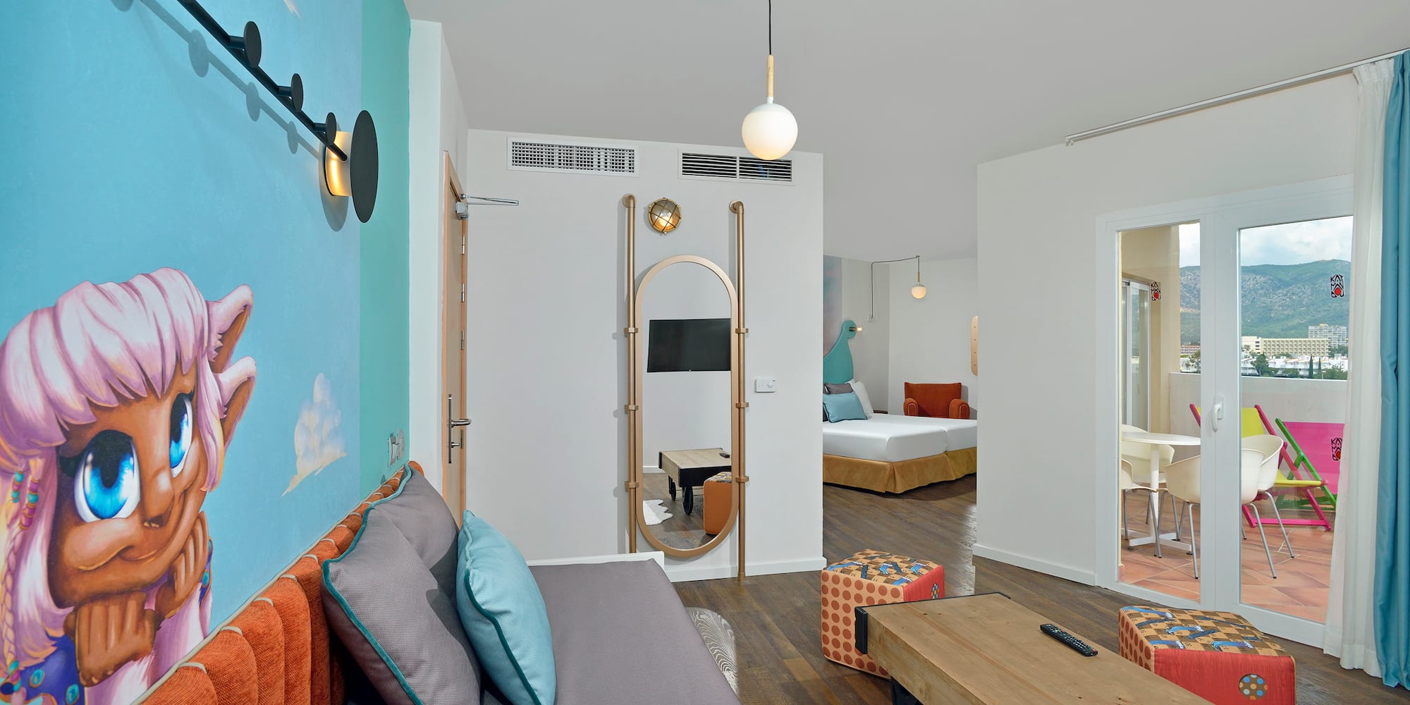 a room with a bed and a mirror