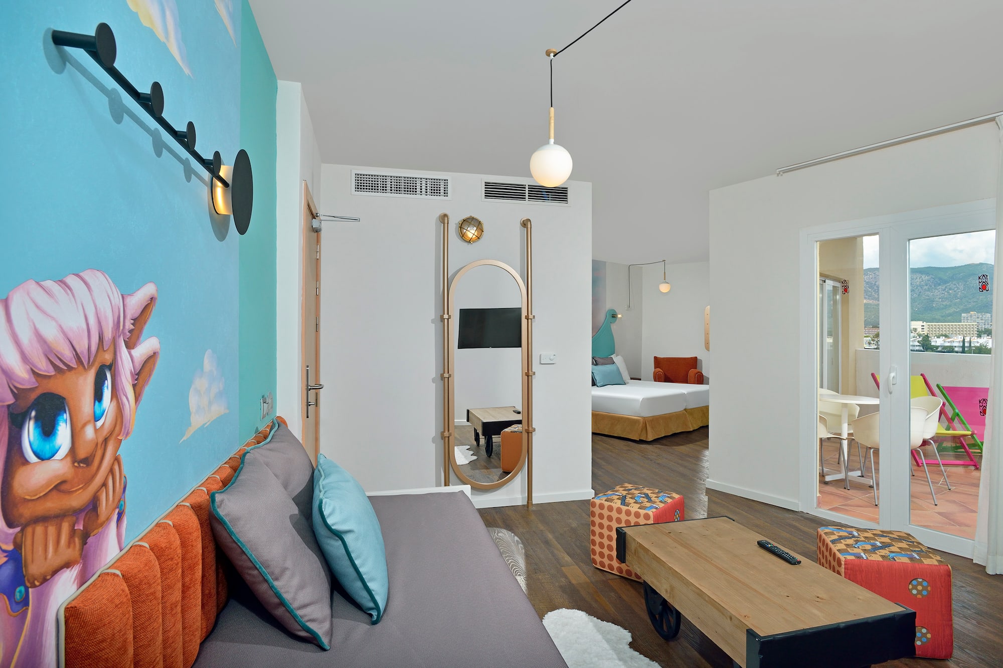 a room with a bed and a mirror