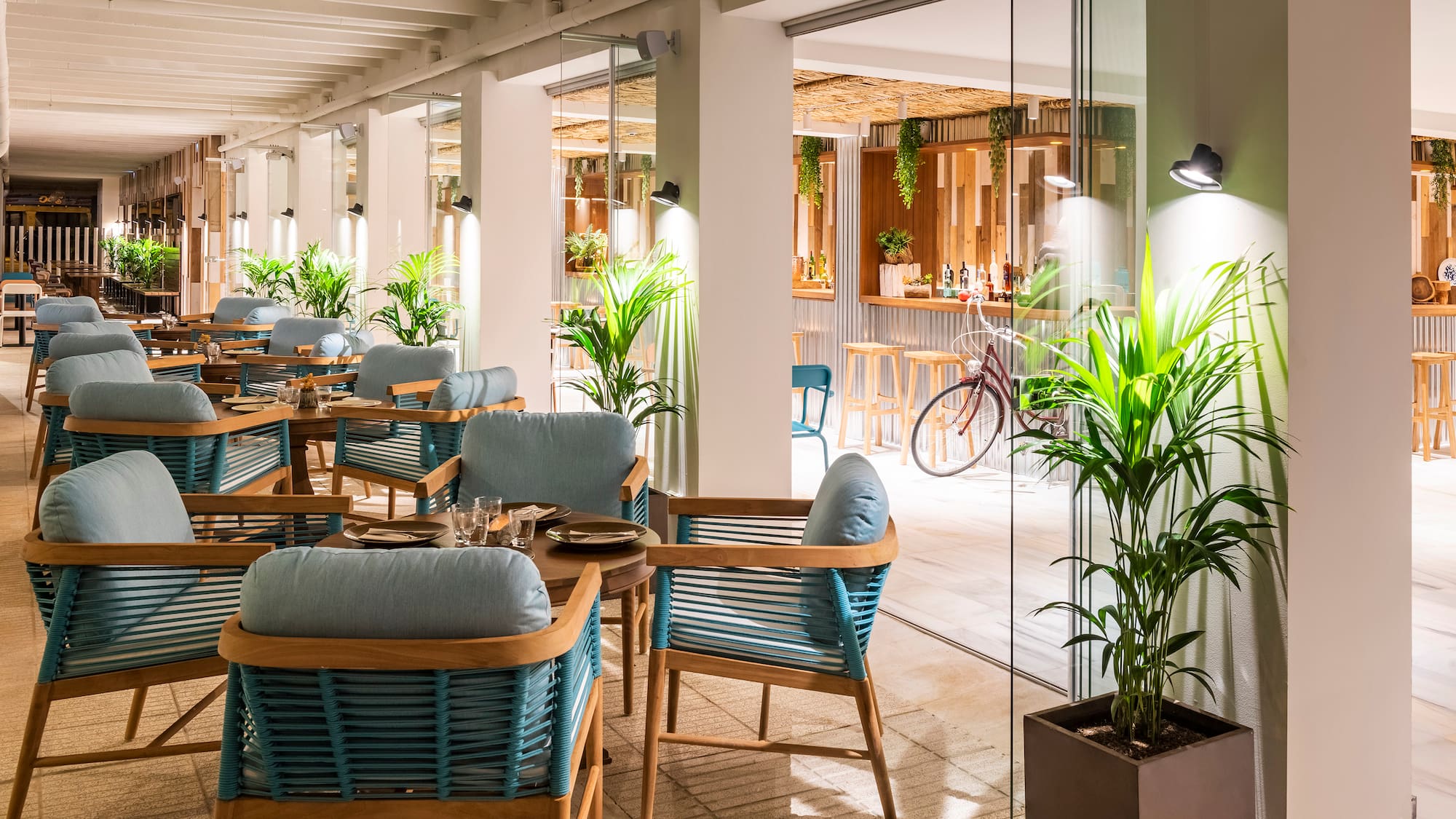 a restaurant with tables and chairs