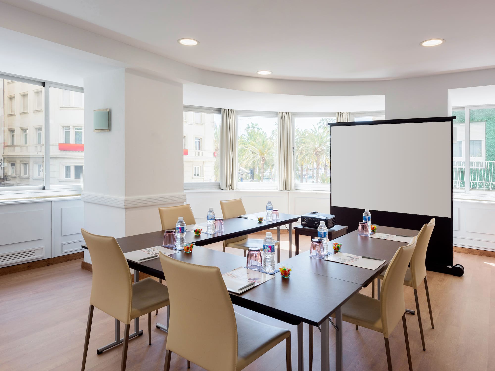 a room with tables and chairs