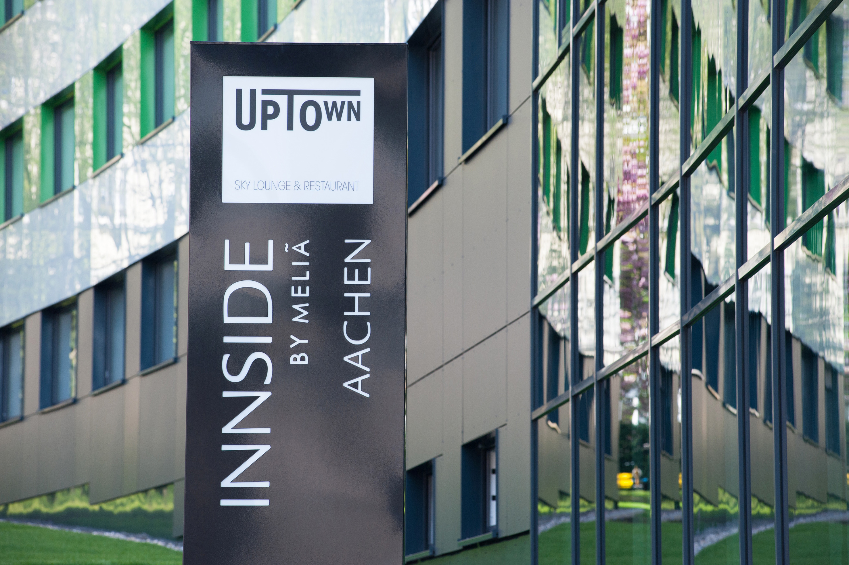 a sign in front of a building