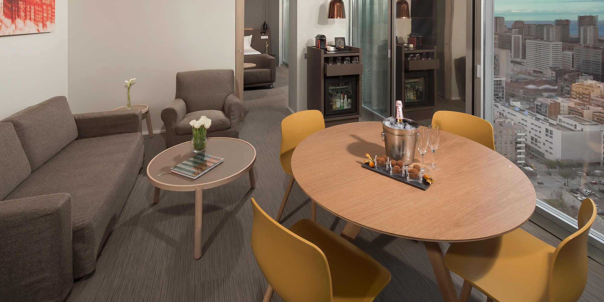 a room with a table and chairs