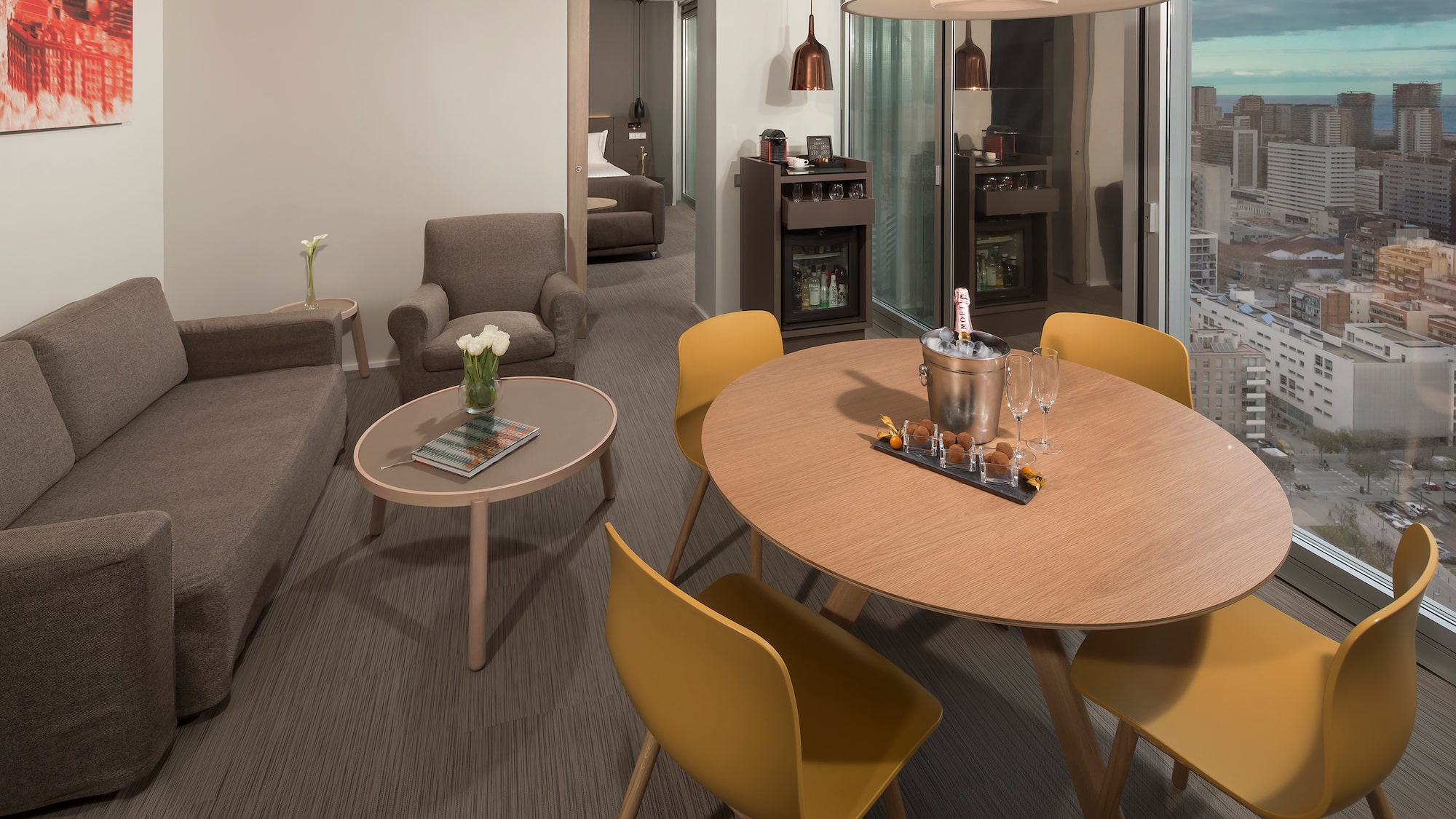 a room with a table and chairs