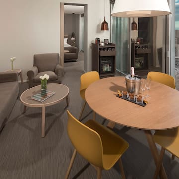 a room with a table and chairs