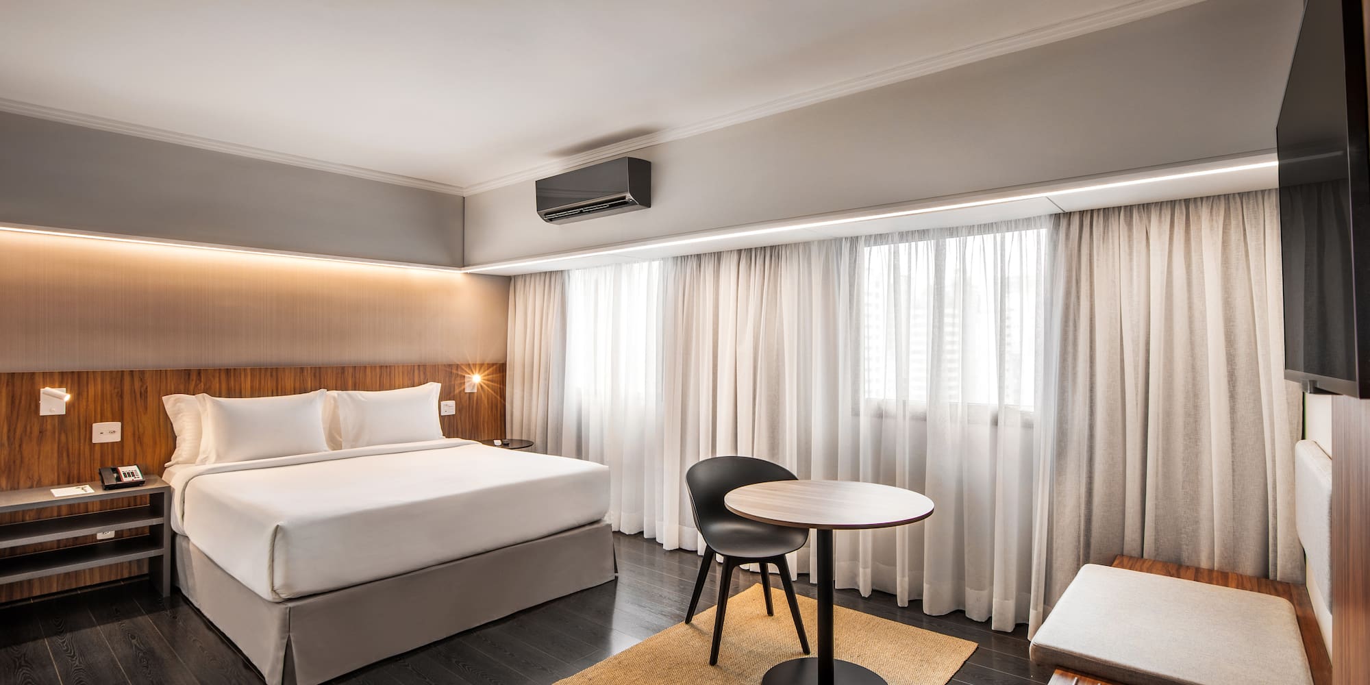 a room with a bed and a table