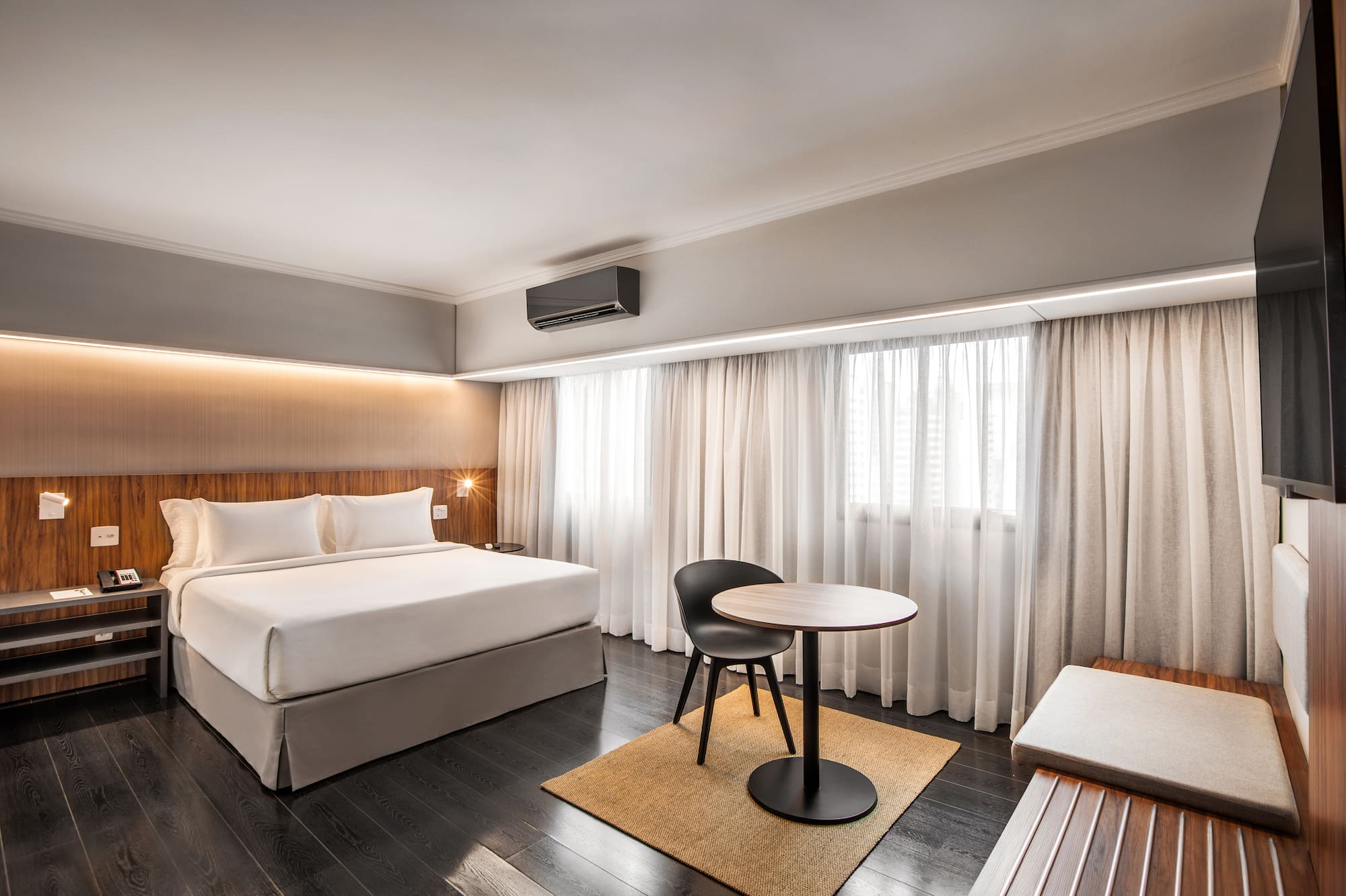 a room with a bed and a table