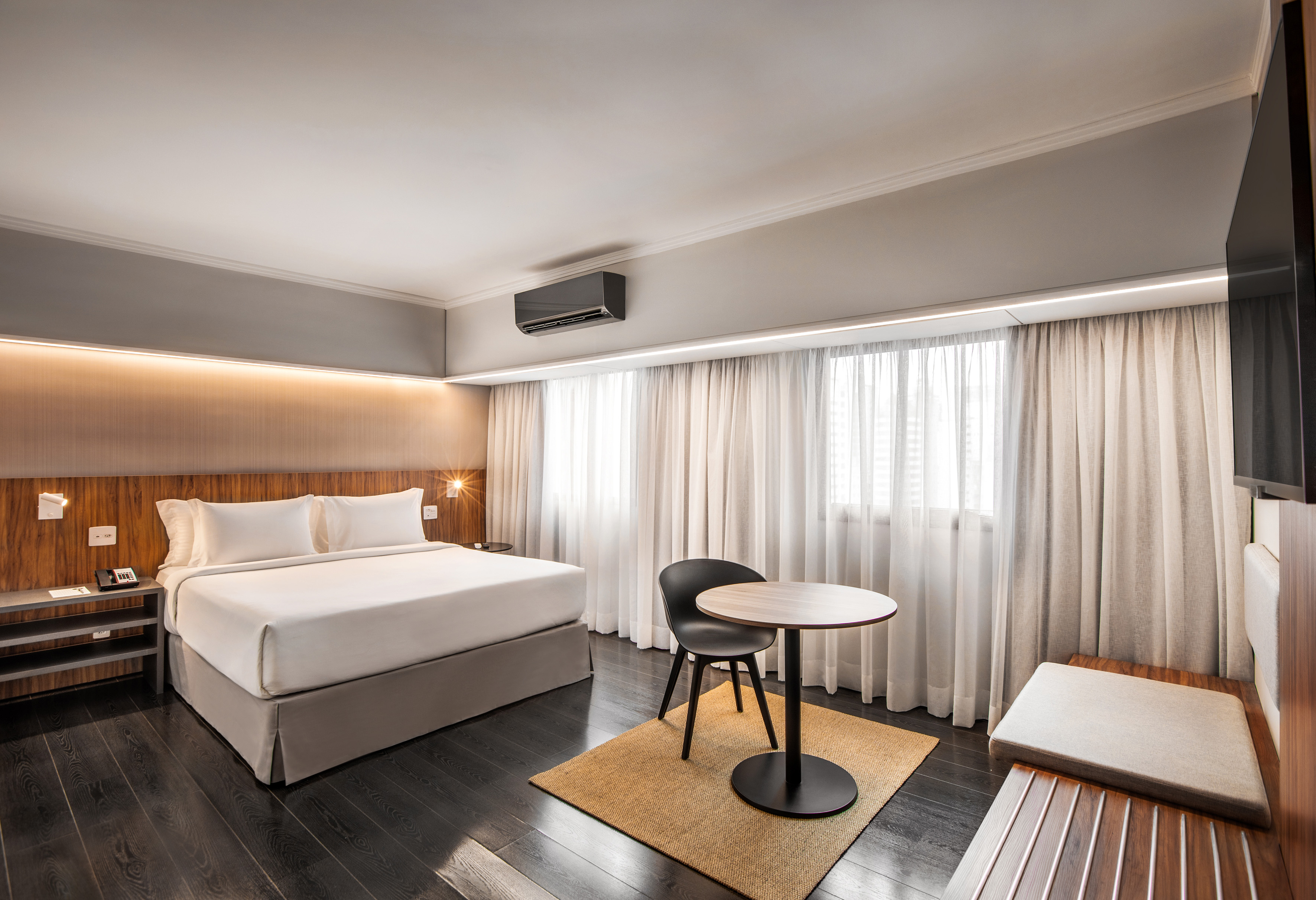 a room with a bed and a table