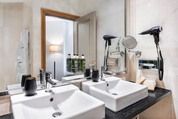 a bathroom with a mirror and sink
