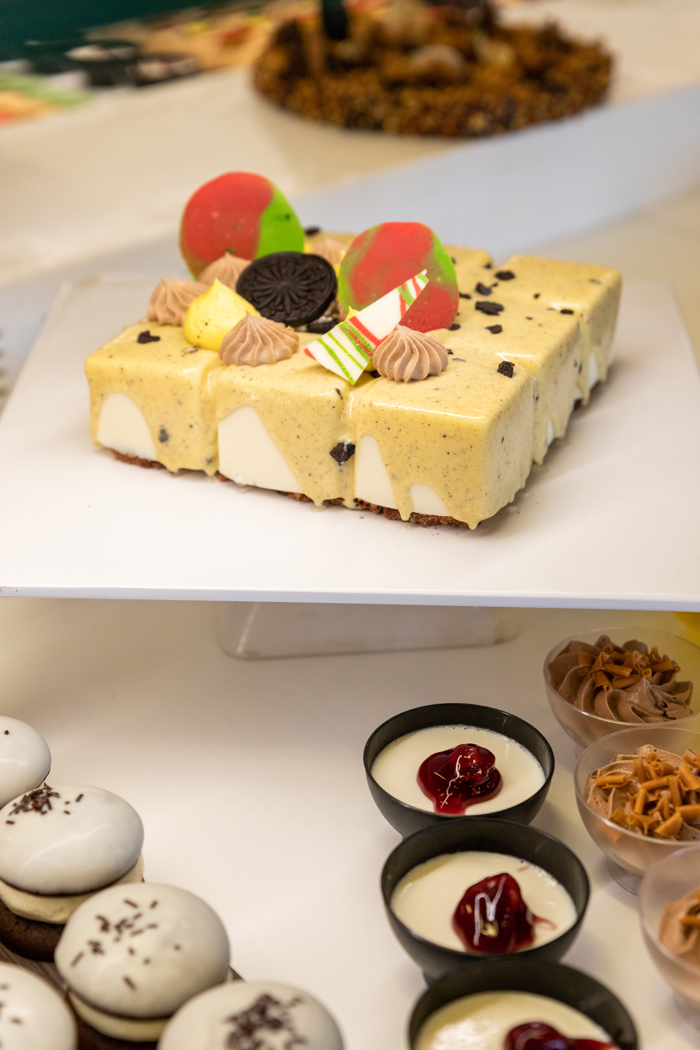 Dessert buffet with vanilla bean cake, chocolate mousse, and panna cotta.