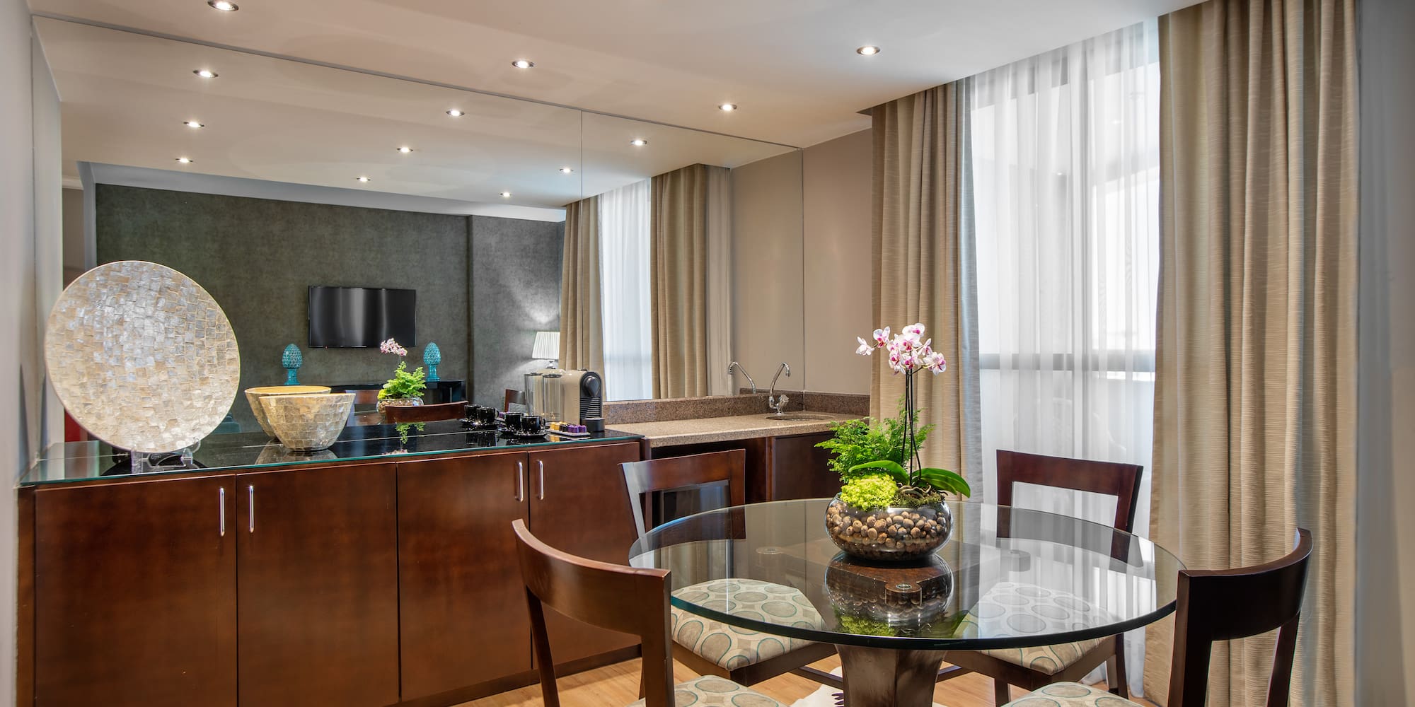 a room with a table and chairs