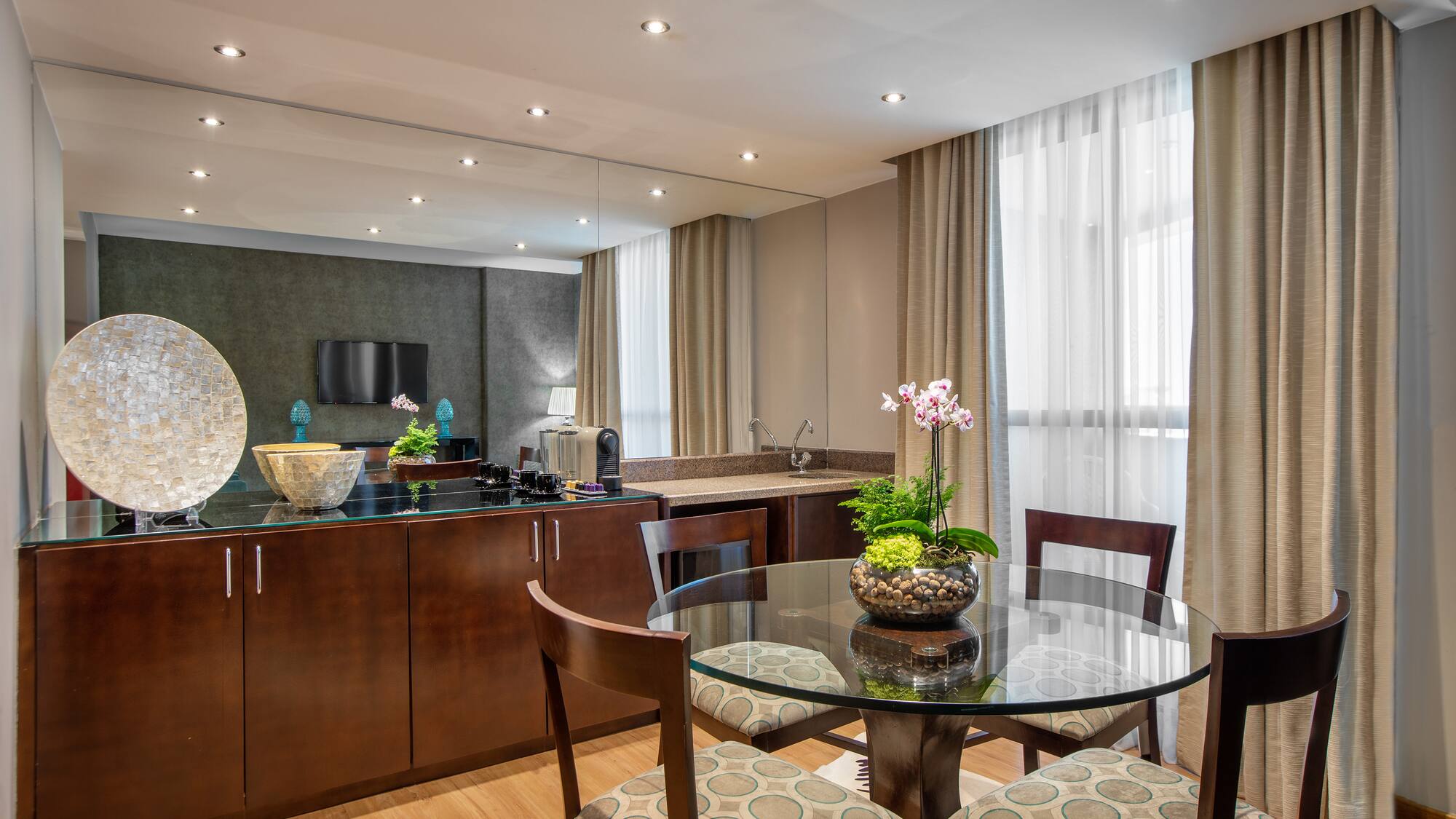 a room with a table and chairs