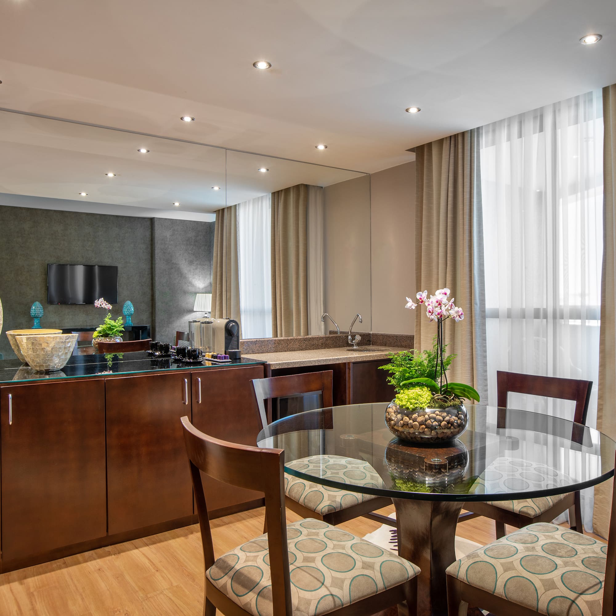 a room with a table and chairs