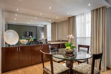 a room with a table and chairs