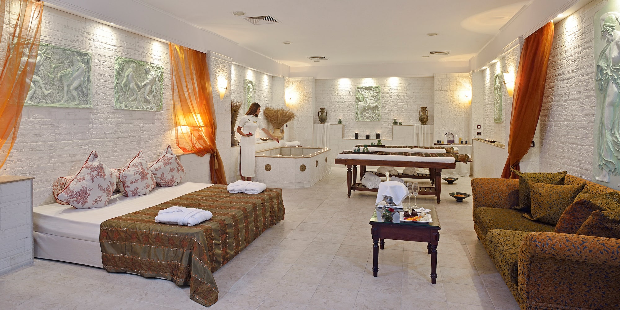 a room with a woman standing in front of a bathtub