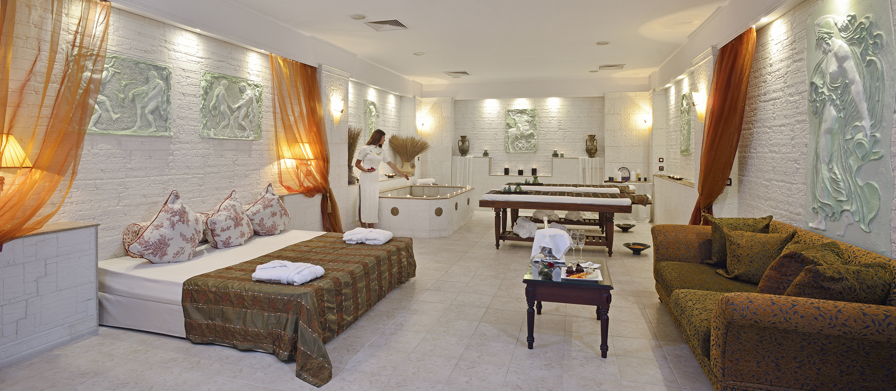 a room with a woman standing in front of a bathtub