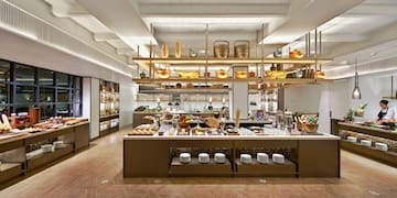 a restaurant with shelves and food