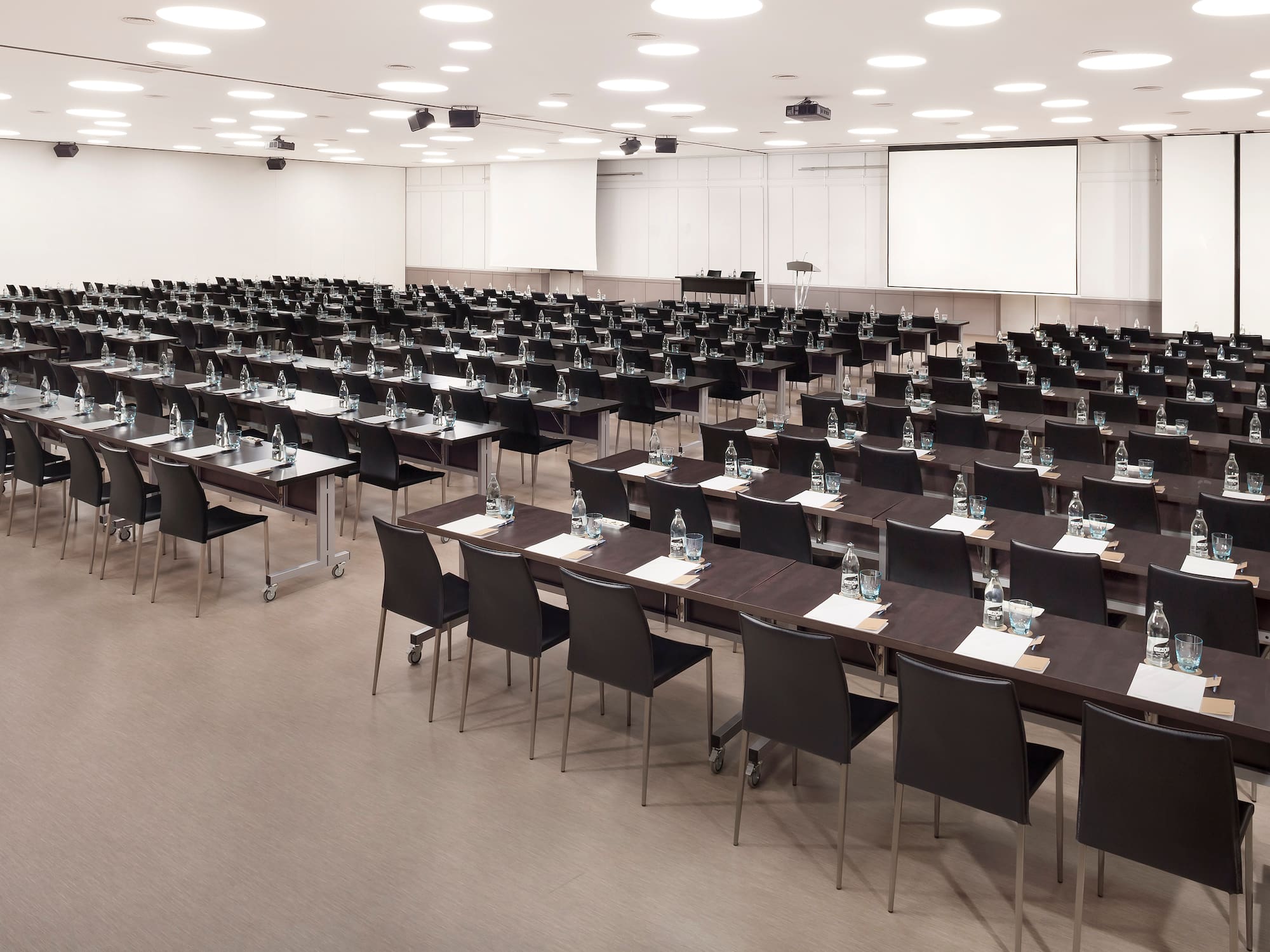 a room with tables and chairs